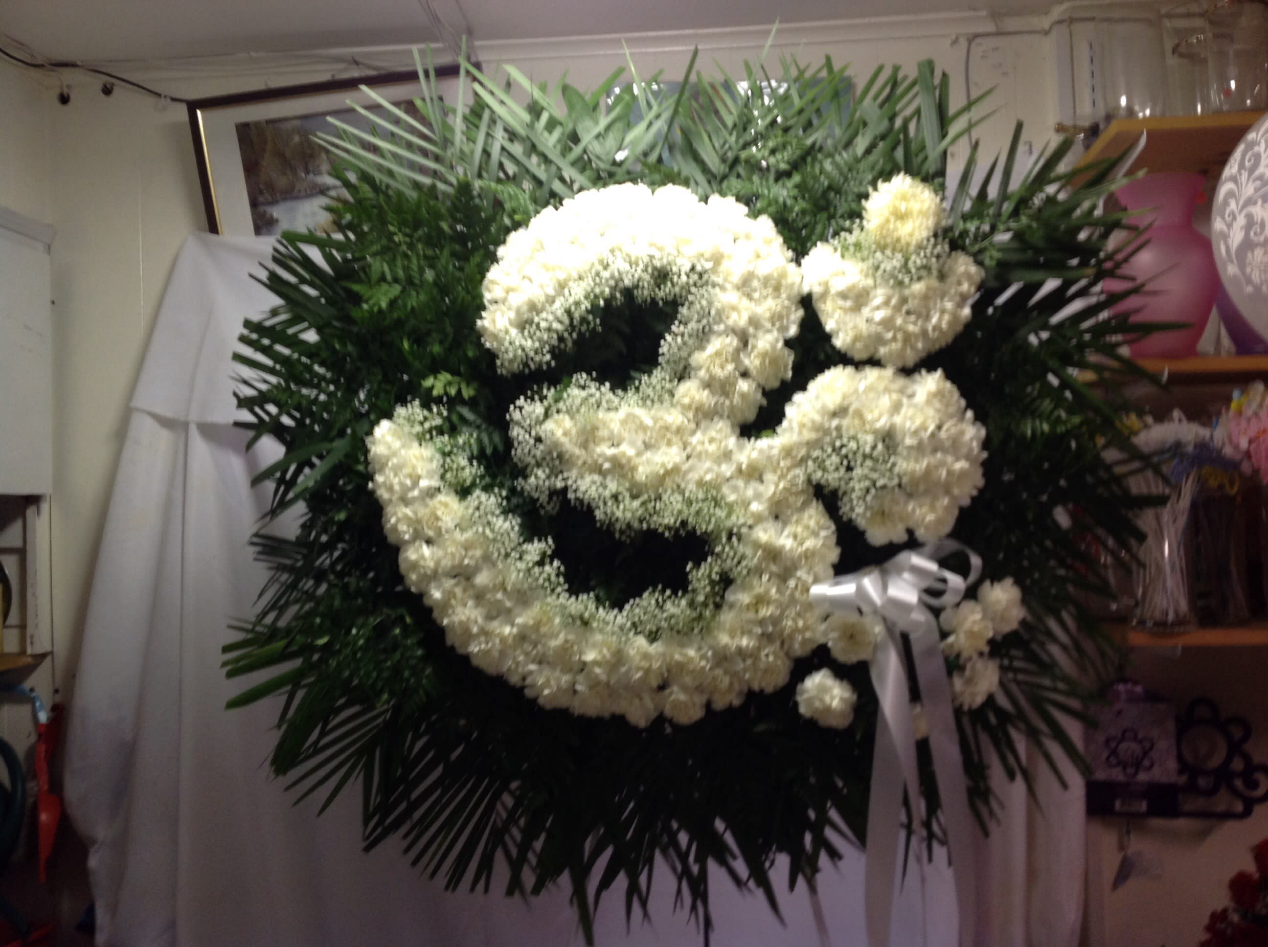 Purity ..standing Om...30-30 Purity ..standing Om...30-30 - All white OM ..a Hindu symbol of sheer purity and peace,, can be make in any color according to availabllty of color off flowers. All carnations with baby's breath