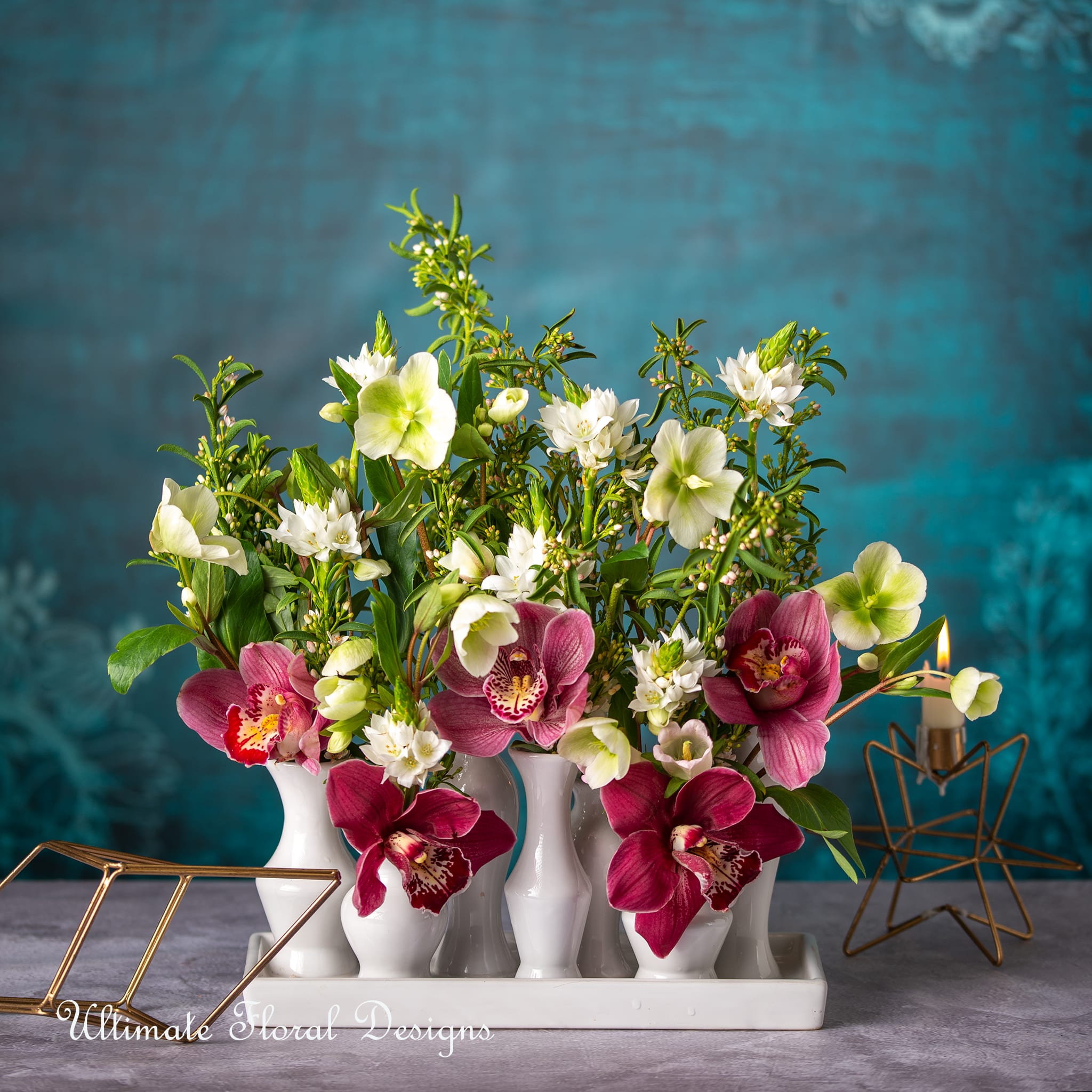 Chic Budvases - “If you look the right way, you can see that the whole world is a garden.” –Frances Hodgson Burnett Helleborus, orchid cymbidiums ,star of Bethlehem
