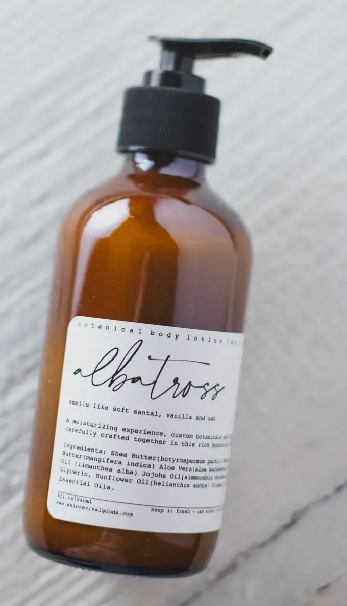 ALBATROS Botanical Body Lotion ALBATROS Botanical Body Lotion - Albatros Botanical Body Lotion Sandal, Vanilla & Oak A moisturizing experience, custom botanicals and signature scents carefully crafted, together, in this rich moisturizing lotion This lotion features shea butter, that provides essential nutrients to the skin. Rich in vitamin A and E, this lotion locks in moisture and softens dry skin with it's high levels of saturated and monosaturated fatty acids. Key Ingredients: Shea Butter(butyrospermum parkii) Sal (shorea) Butter Aloe Vera(aloe barbadensis) Coconut (cocos nucifera) Oil, Abyssinian (crambe abyssinica) Oil, Jojoba Oil(simmondsia chinensis) Vegan Glycerin, Sunflower Oil(helianthus annus) Vitamin E, Clean Fragrance Blend *These products are best used within 4-6 months of purchase.