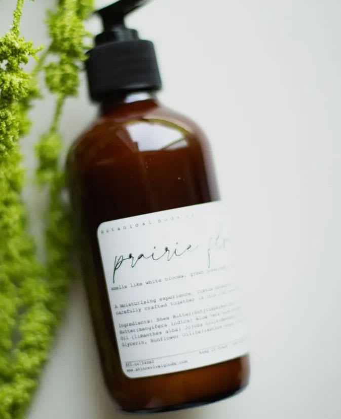PRAIRIE FLOWER Botanical Body Lotion PRAIRIE FLOWER Botanical Body Lotion - PRAIRIE FLOWER Botanical Body Lotion Blooms & Grasslands A moisturizing experience, custom botanicals and signature scents carefully crafted, together, in this rich moisturizing lotion This lotion features shea butter, that provides essential nutrients to the skin. Rich in vitamin A and E, this lotion locks in moisture and softens dry skin with it's high levels of saturated and monosaturated fatty acids. Key Ingredients: Shea Butter(butyrospermum parkii) Sal (shorea) Butter Aloe Vera(aloe barbadensis) Coconut (cocos nucifera) Oil, Abyssinian (crambe abyssinica) Oil, Jojoba Oil(simmondsia chinensis) Vegan Glycerin, Sunflower Oil(helianthus annus) Vitamin E, Clean Fragrance Blend *These products are best used within 4-6 months of purchase.