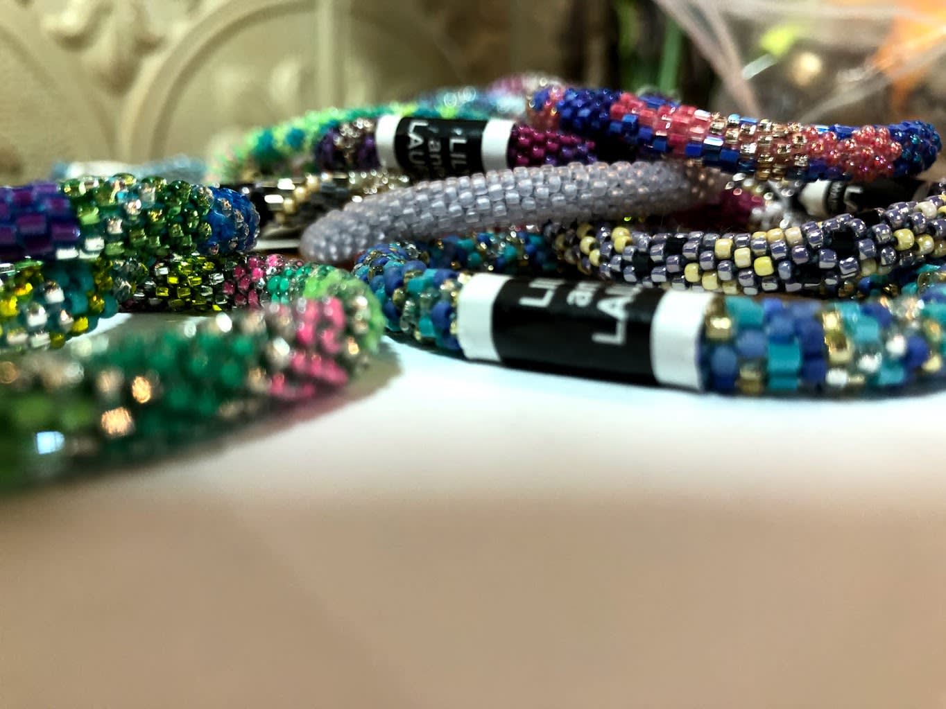 Lilly and Laura bracelets - One braclet for $12, 3 bracelets for $30. Suggest a color and style you would prefer in the discription. We also can ship these easily.