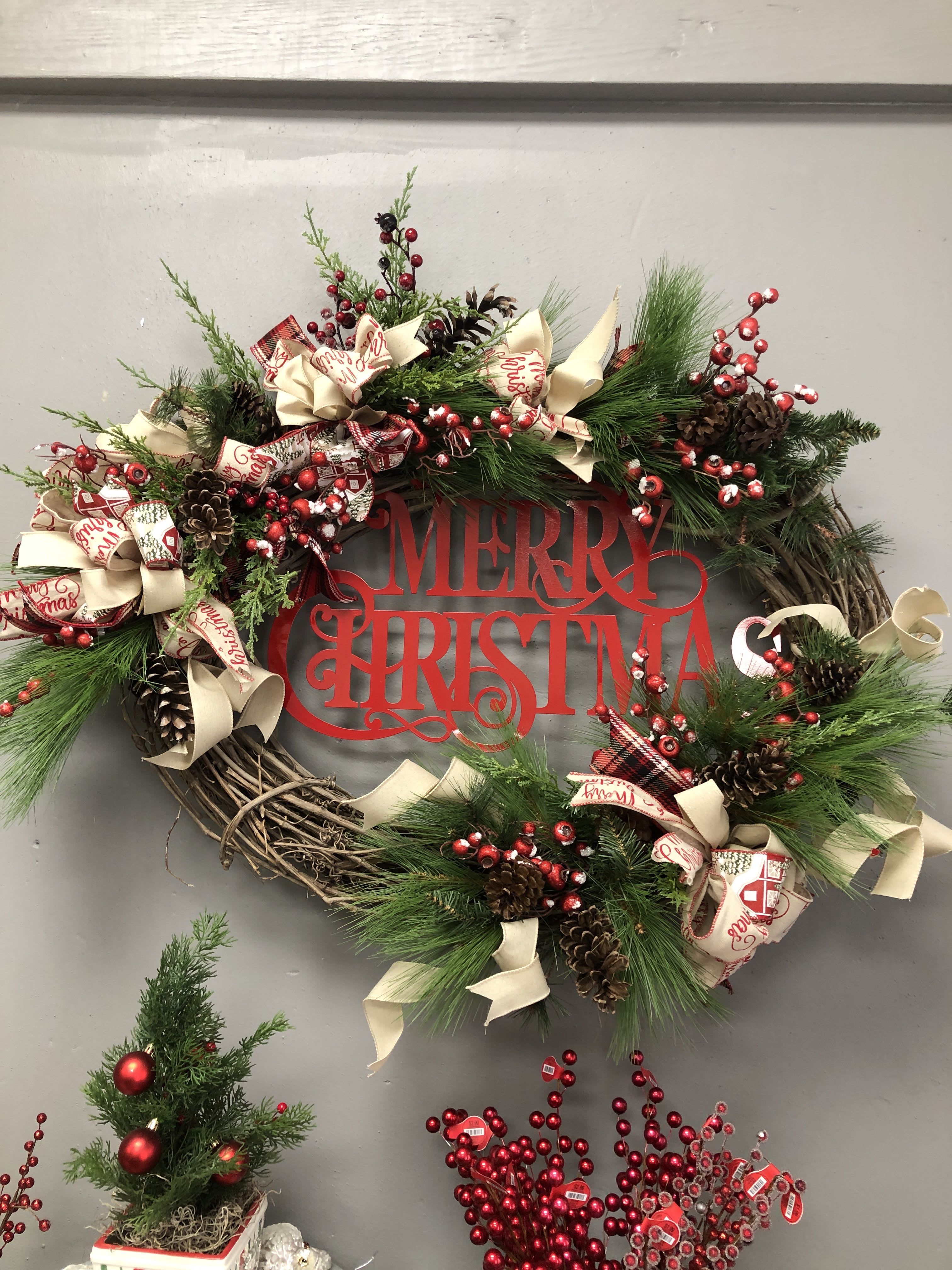 Large Christmas Wreath - This large show stopping wreath is sure to make a grand entrance with its base measuring more than 3 FEET across. With a rustic, yet traditional flare this wreath is more than a welcoming eye catcher.