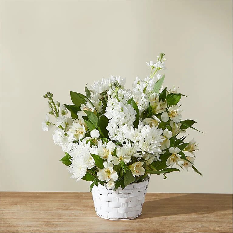 Eternal Affection - Share how much you care with an abundance of elegant white florals. Designed in a basket, Eternal Affection features alstroemeria, roses, poms and more. A fitting gift to send for sympathy, get well or any occasion.