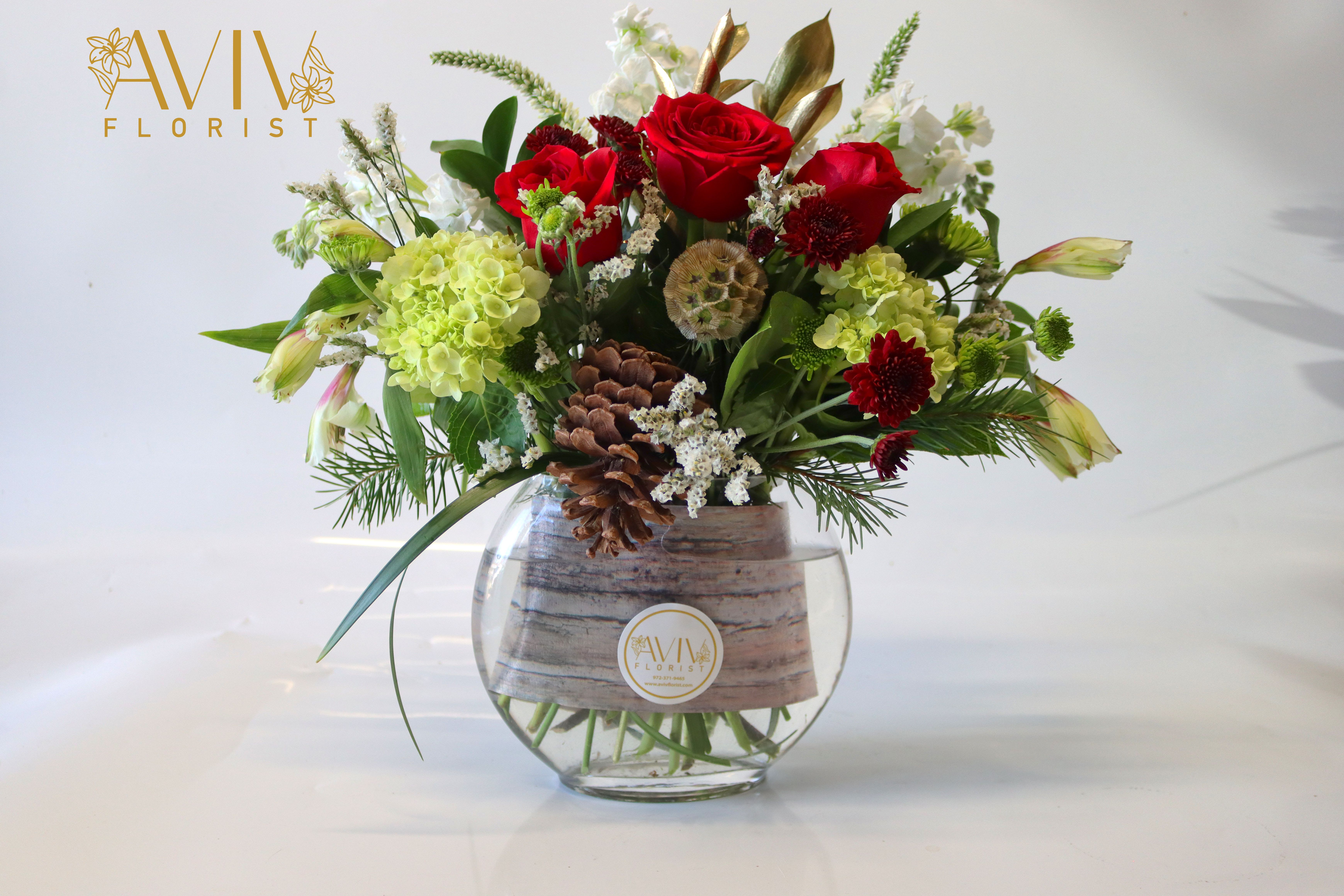 Winter Joy - What’s the best part of Friday? Flowers. That’s the answer. If you’re skeptical, let us prove it to you. Order the Festive Friday arrangement today and add a whole new, flowery dimension to your weekend.