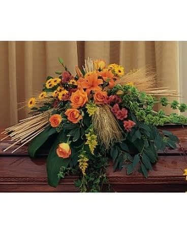 Autumn Faith Casket Spray Autumn Faith Casket Spray - This casket spray with its vibrant autumn flowers will offer up plenty of comfort to friends and loved ones alike. One casket spray arrives with vibrant orange lilies and roses, chrysanthemums and alstroemeria, accented with bunches of dried wheat. Approximately 39" W x 44" H Orientation: All-Around As Shown : TF210-1