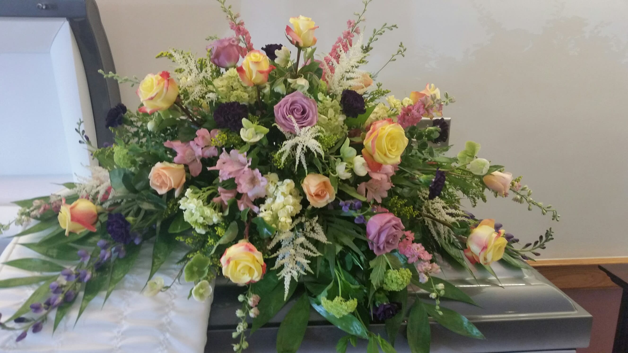 Casket Spray 8 Casket Spray 8 - HALF casket spray multi colored in a traditional style **CHOOSE Deluxe or Premium for a FULL casket spray**
