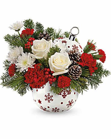 Teleflora's Snowy Sparkle Bouquet  Teleflora's Snowy Sparkle Bouquet - Illuminate the season with this vibrant Christmas bouquet, housed in a festive ceramic ornament jar adorned with sparkling stars and a glossy, hand-painted finish.