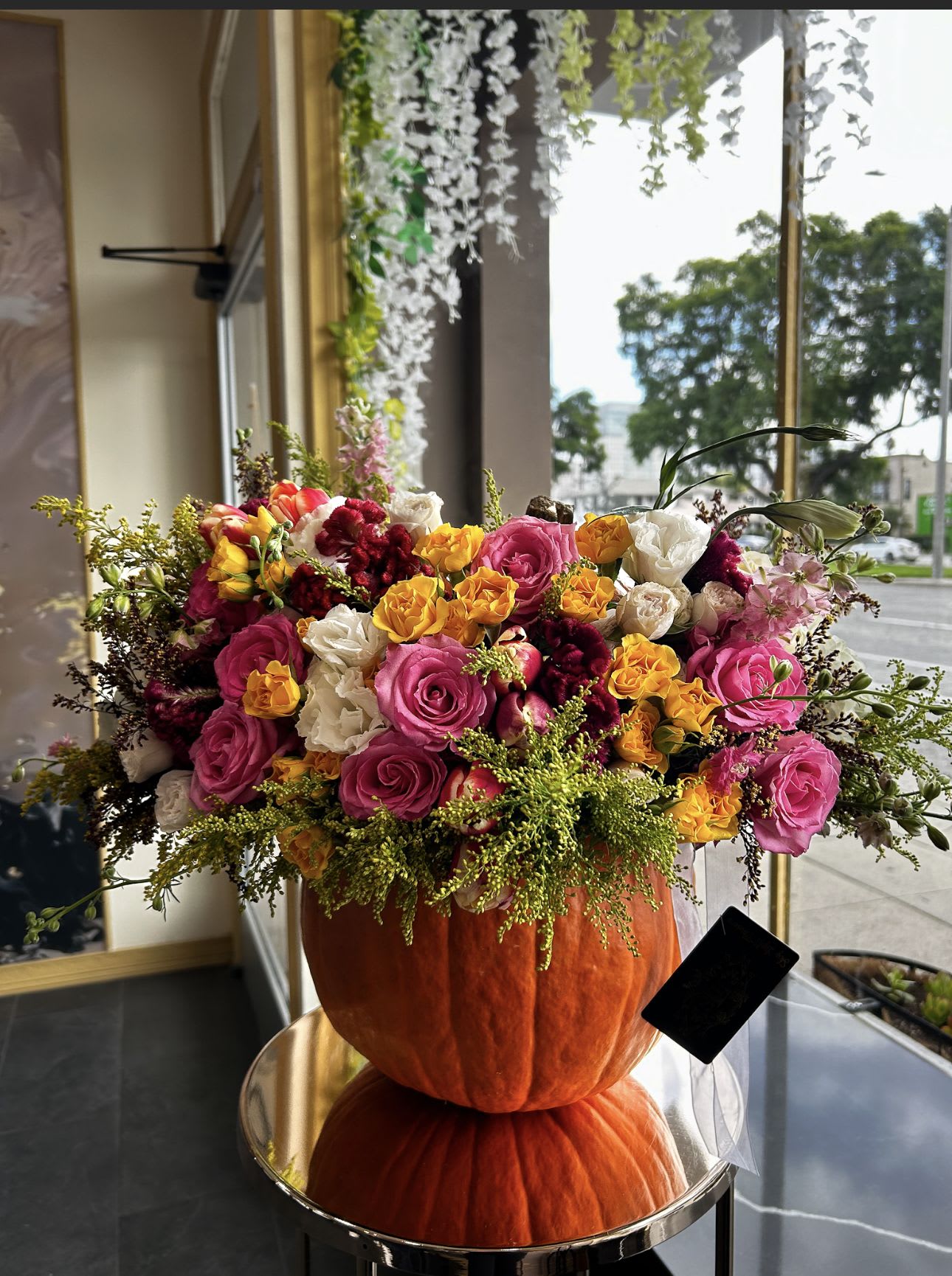 Pumpkin treasures Pumpkin treasures - Brighten your autumn celebrations with our Limited Edition Fall Pumpkin Floral Arrangement! Bursting with vibrant seasonal blooms, this stunning display is artfully arranged in a fresh pumpkin, creating a unique centerpiece that captures the essence of fall. Perfect for gatherings or as a thoughtful gift, this arrangement adds warmth and charm to any space. Elevate your decor with this captivating piece that brings joy and seasonal spirit to your home or office. Don’t miss out—order your exclusive Fall Pumpkin Floral Arrangement today and let the beauty of autumn inspire you!