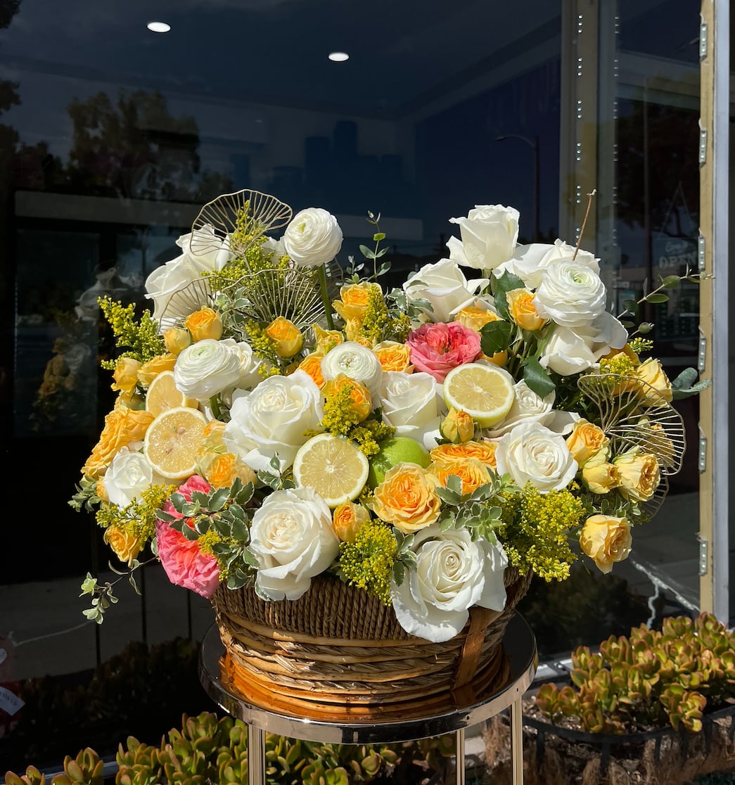 lemon love lemon love - Brighten any space with our Elegant Flower Box Arrangement! Bursting with vibrant blooms, this stunning display combines seasonal favorites with lush fillers. Housed in a chic, reusable container, it makes a perfect centerpiece for any occasion be it a gift or a treat for yourself. Elevate your decor with this captivating arrangement that brings joy and sophistication to your home or office. Order yours today and let the beauty of flowers inspire you!