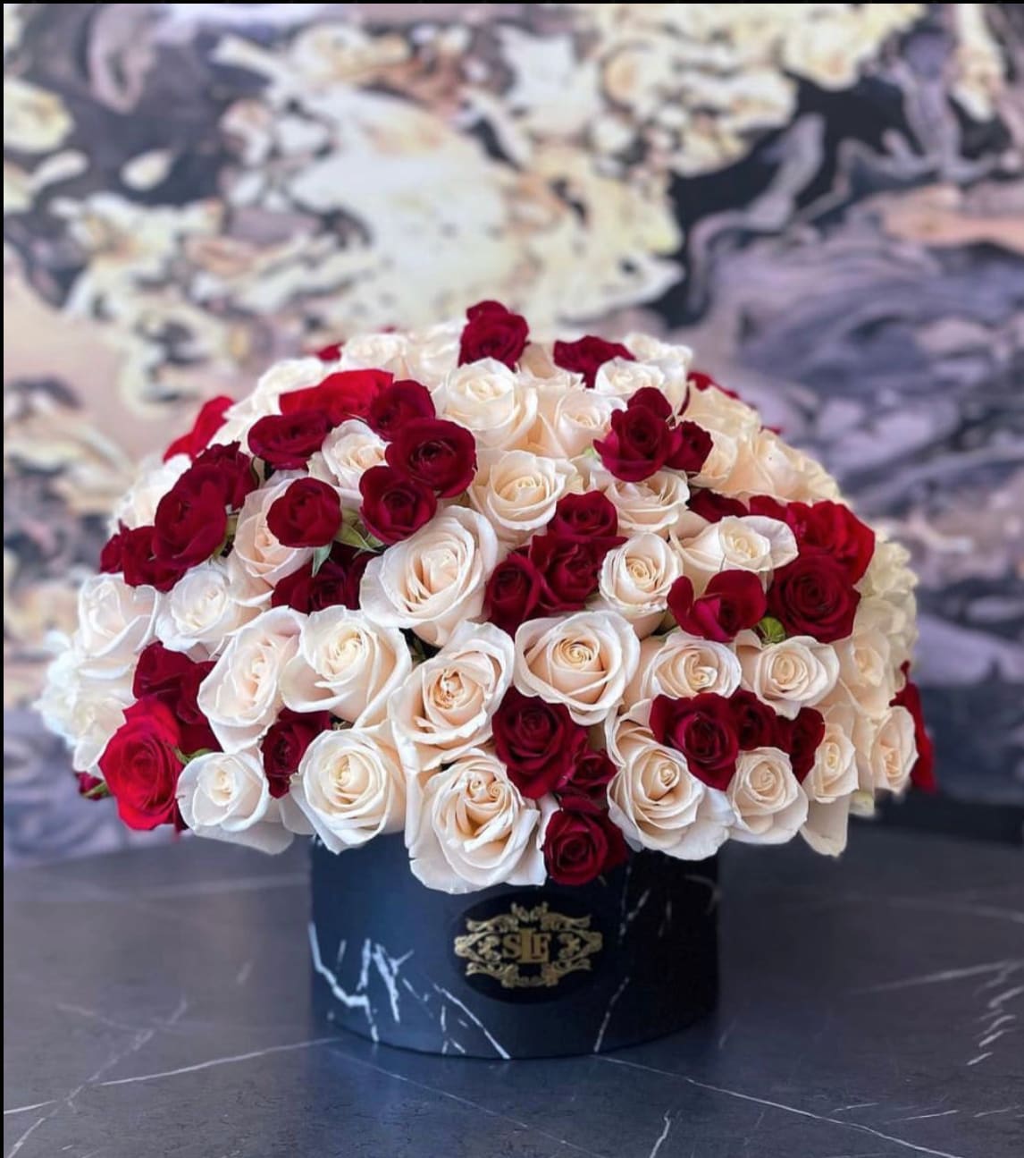 Ruby rose box Ruby rose box - Brighten any space with our Elegant Flower Box Arrangement! Bursting with vibrant blooms, this stunning display combines seasonal favorites with lush fillers. Housed in a chic, reusable container, it makes a perfect centerpiece for any occasion be it a gift or a treat for yourself. Elevate your decor with this captivating arrangement that brings joy and sophistication to your home or office. Order yours today and let the beauty of flowers inspire you!