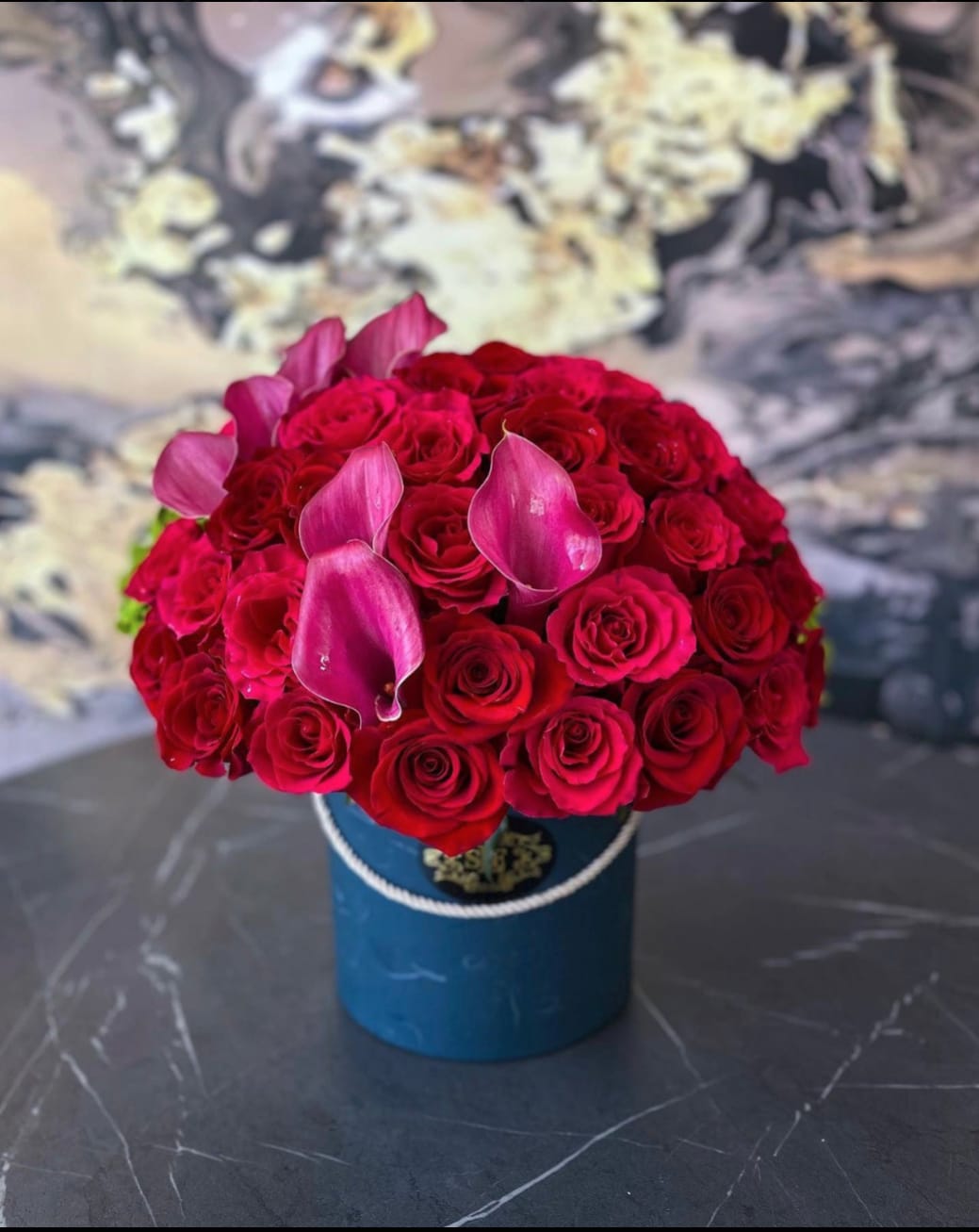 Rustic Rose garden - Brighten any space with our elegant flower box arrangement! Bursting with vibrant blooms this stunning display combines seasonal favorites with lush greenery.   Housed in a chic, reusable container, it makes a perfect centerpiece for any occasion be it a gift or a treat for yourself. Elevate your decor with this captivating arrangement that brings joy and sophistication.  Order yours today and let the beauty of flowers inspire you!