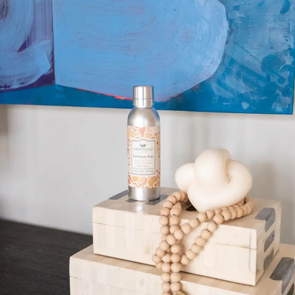 Cashmere Kiss Room Spray Cashmere Kiss Room Spray - Enjoy an instant burst of your favorite Greenleaf fragrance with just one spray! Our Non-Aerosol Room Spray is perfect for fragrancing bathrooms, bedrooms, and every room in between. What Makes it Special: Beautiful fragrance created in-house by a team of professional perfumers Non-aerosol Fragrance: Cashmere Kiss Fragrance Family: Floral Fragrance Description: Cashmere Kiss is bound by passion and romance. Stirring citrus accords tenderly fold into fields of jasmine and rose. Use and Care: Shake well before use Spray mist directly into the air to refresh your space Specifications Volume: 7 oz Product Size (inches): 2.0l x 2.0w x 7.0h Package Weight (pounds): 0.6