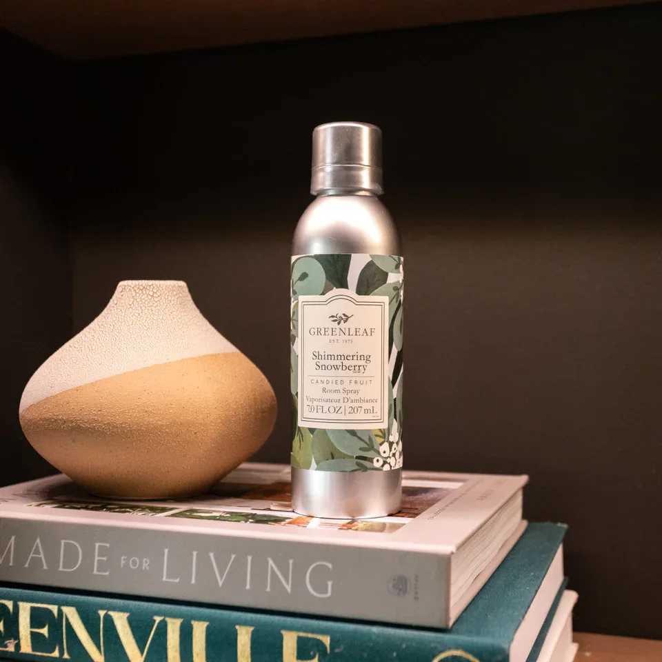 Shimmering Snowberry Room Spray Shimmering Snowberry Room Spray - Enjoy an instant burst of your favorite Greenleaf fragrance with just one ' spray! Our Non-Aerosol Room Spray is perfect for fragrancing bathrooms, bedrooms, and every room in between. What Makes it Special: Beautiful fragrance created in-house by a team of professional perfumers Non-aerosol Fragrance: Shimmering Snowberry Fragrance Family: Fruit & Vine Fragrance Description: Glistening with modernity, Shimmering Snowberry juxtaposes a tart glaze of grapefruit, apple and kiwi with fresh-cut bouquets of sweet jasmine and lily. Use and Care: Shake well before use Spray mist directly into the air to refresh your space