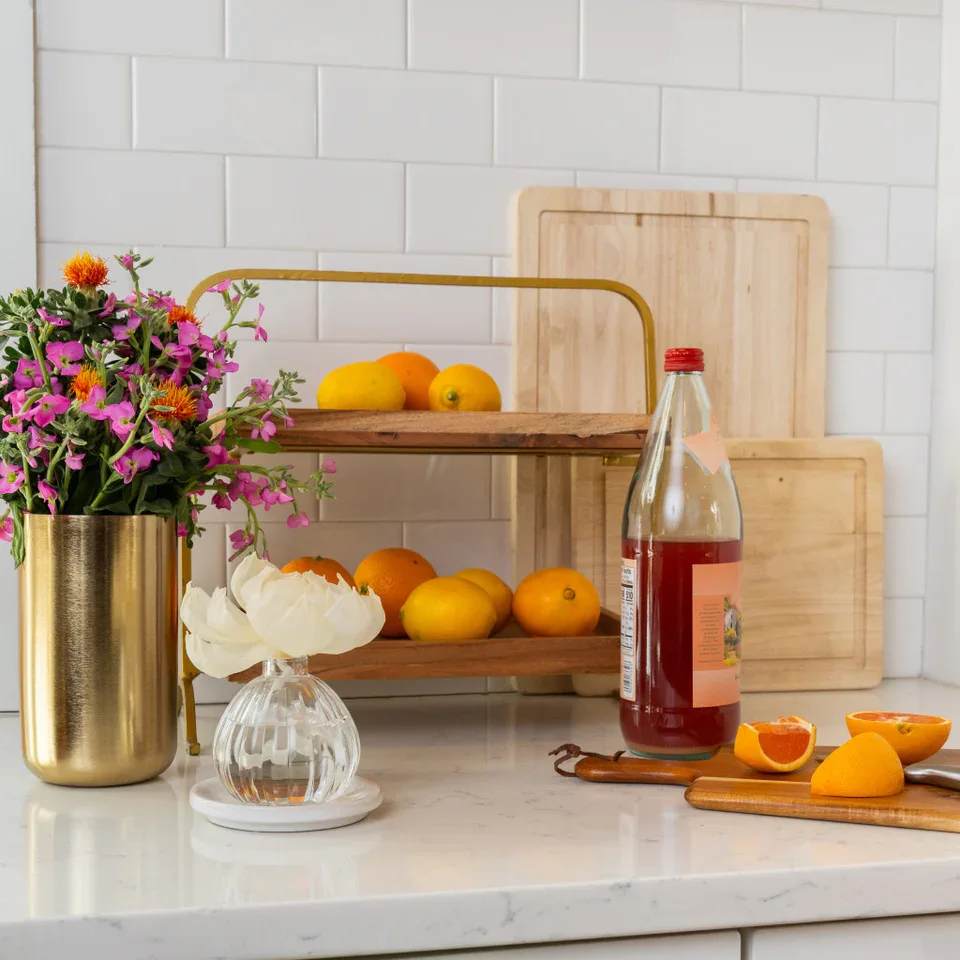 Orange & Honey Flower Diffuser Orange & Honey Flower Diffuser - Our Flower Diffuser includes your favorite Greenleaf fragrance oil and a sola paper flower that emits a beautiful, blooming scent for up to 60 days! As the fragrance oils are absorbed through the wick, the flower begins to “bloom,” slowly emitting the fragrance and eventually resembling real flower petals. Did you Know? You can use a Refill! Bring your Flower Diffuser back to life by using the entire contents of one of our Reed Diffuser Oil Refills in the same fragrance to enjoy your Flower Diffuser one additional time after initial use. What Makes it Special: Beautiful fragrance created in-house by a team of professional perfumers Through Greenleaf Cares, proceeds of this product support organizations in the fight to end human trafficking Fragrance: Orange & Honey Fragrance Family: Fruit & Vine Fragrance Description: Revitalizing through and through, Orange & Honey lands the senses amidst a picturesque orange grove where clusters of nature's candy gleam in ripened glory. Use and Care: Place diffuser vase on a flat, stable surface Holding glass at base, carefully twist the cork out of the container Extend the stem of the flower fully and place it into the bottle, ensuring that the wire located within the wick is fully inserted into the neck of the container Enjoy the fragrance as well as the beauty of the flower as it blooms for up to 60 days When all the oil has been diffused and the flower begins to dry out, replace your Flower Diffuser
