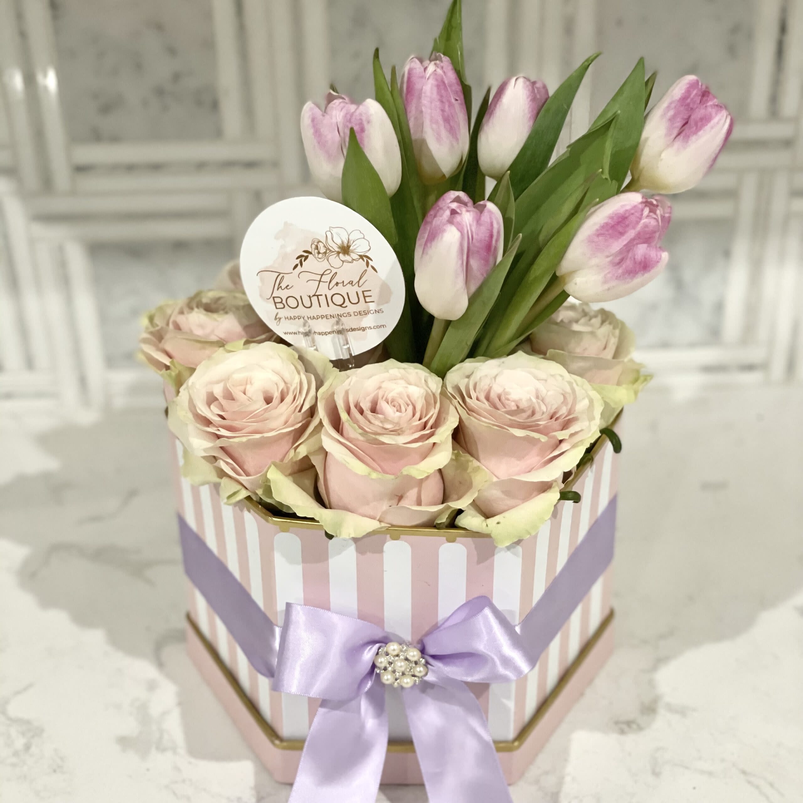 Tulips and Roses - 24 premium roses with accent flowers and orchids