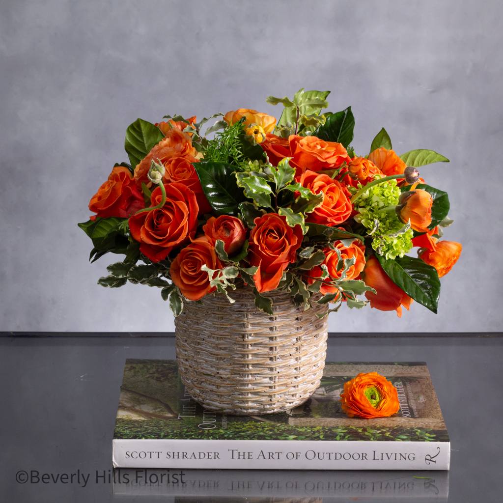 Garden Song - Pasadena Florist - Embark on an instant journey into radiant beauty with our enchanting floral arrangement, all set for same-day delivery. Nestled in a decorative ceramic pot with a basket-like appearance, this stunning creation stands approximately 15 inches round and is a true testament to elegance.