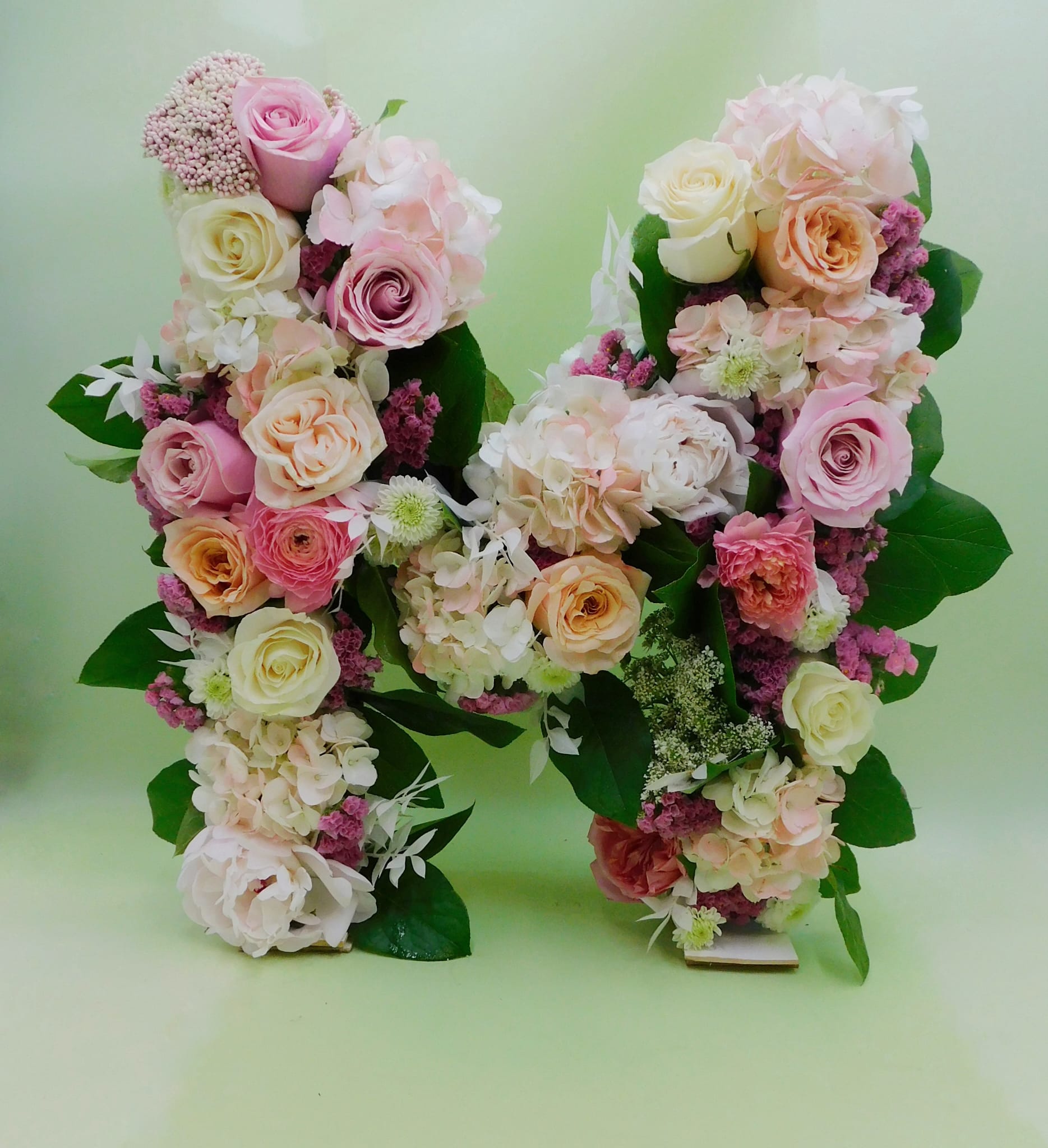 Written Poem Written Poem - Beautiful Letter embellished with seasonal flowers. (Available in all alphabetical letters) The bouquet pictured reflects our original design for this product. While we always try to follow the color palette, we may replace stems to deliver the freshest bouquet possible, and we may sometimes need to use a different vase. We have a simple goal – delight our customers with flowers that are high quality, fresh, and beautiful. While we may occasionally need to substitute for color or flower variety, we promise that the blooms you receive will be fresh and wow you or your gift recipient.