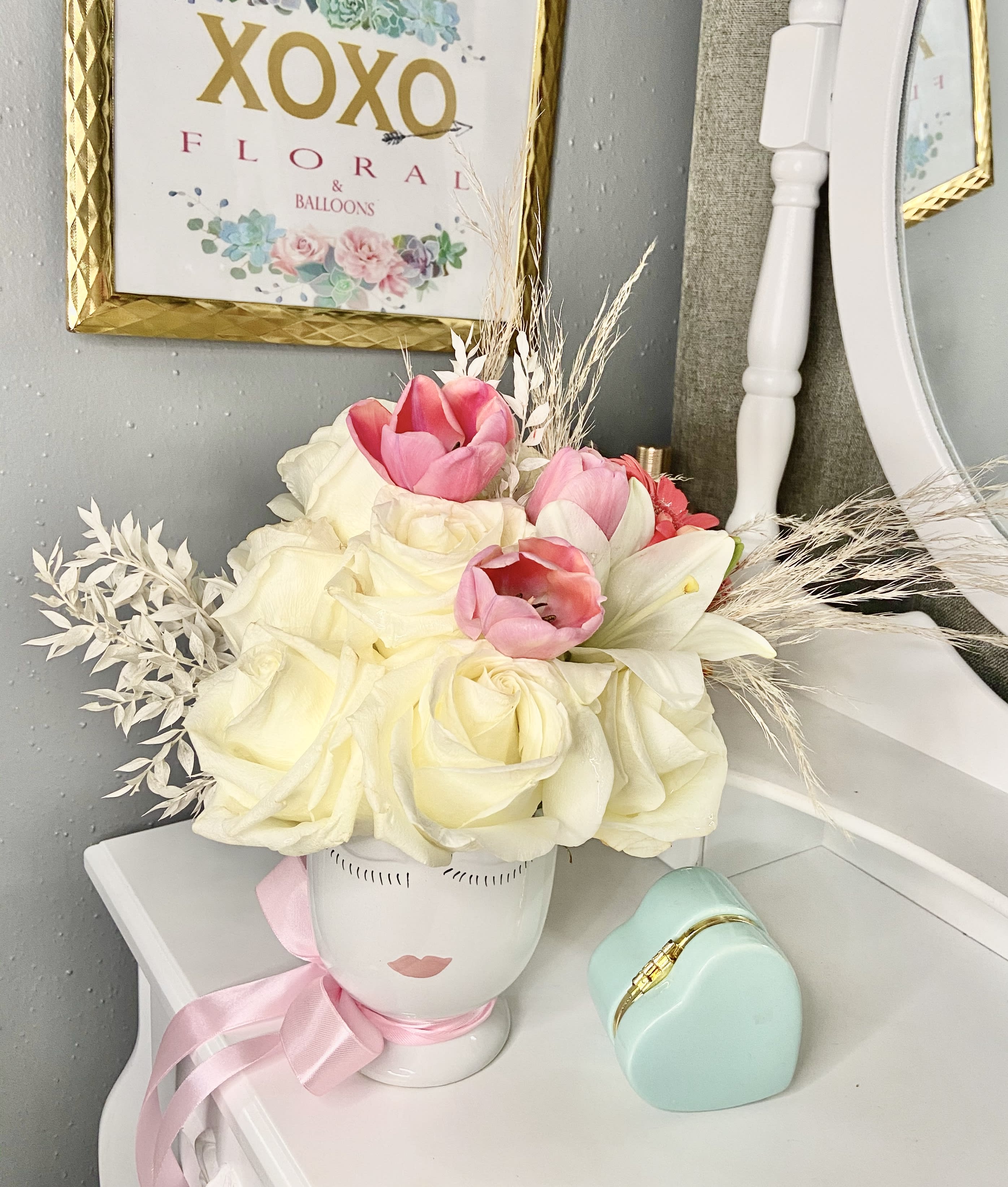 Madame - Madame, Madame... La simplicité est la clé de l’élégance... “Simplicity is the key to elegance”  Our Madame floral arrangement contains our elegant premium white roses, tulips, pampas,asiatic lilies, and bleached italian ruscus. Absolutely an elegant floral arrangement that represents a feminine personality.  French style floral arrangement 