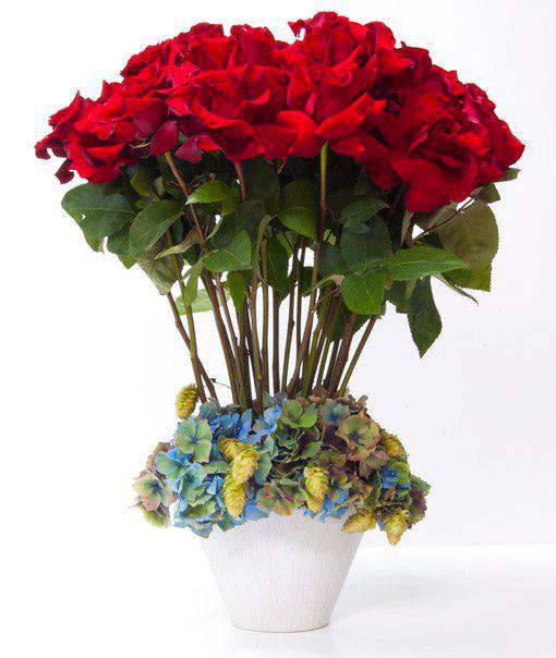 Red Roses Standing Tall - Dozens of long-stemmed red Roses standing in grouping of multicolored Hydrangeas, placed into a ceramic vase has the dimensions of: a base of 5&quot;, a head of 15&quot;, and a height of 24&quot;. These giant Roses are sure to stand out from any other gift because of their eloquent expression. Order one today to make the perfect gift or bring some living beauty to any home.
