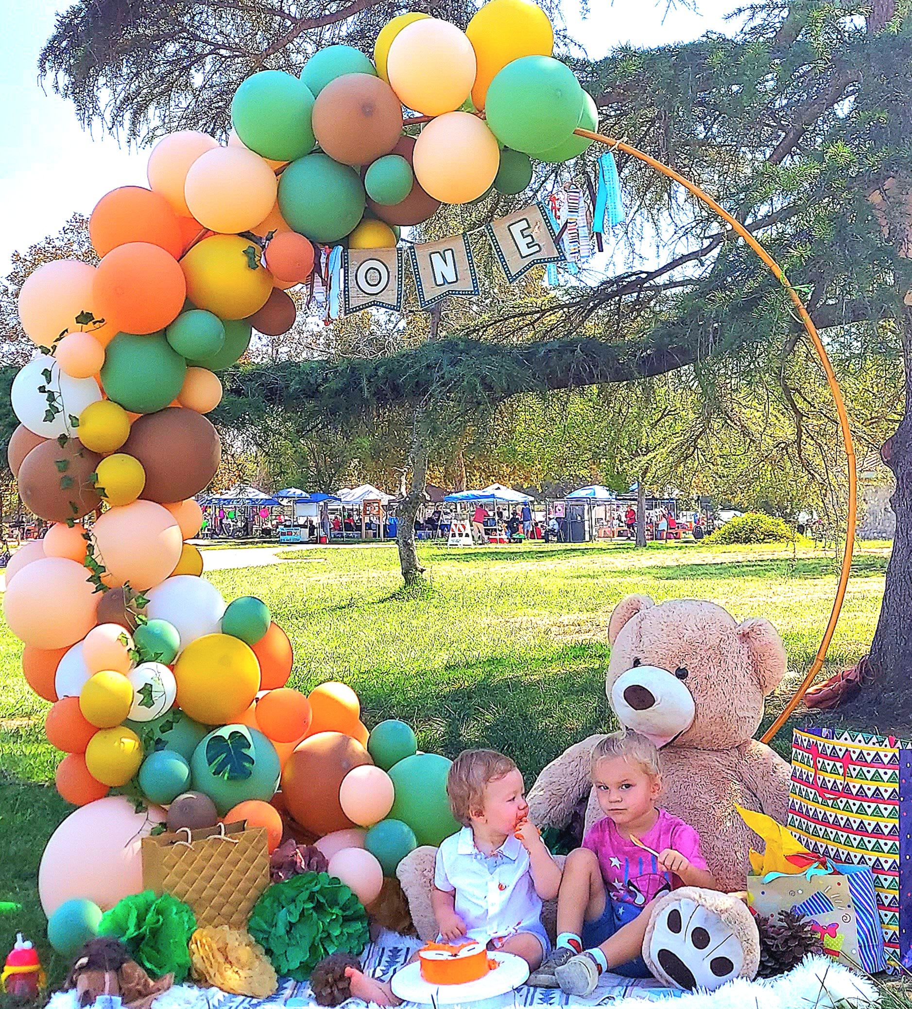 Woodland Bear Adventure - Immerse yourself in a charming forest-themed celebration with the &quot;Woodland Bear Adventure&quot; balloon arch, featuring the adorable Taddy Bear. This delightful arch combines earthy greens, soft pinks, and warm browns, creating a cozy, nature-inspired atmosphere. Perfect for baby showers, birthdays, or any event with a whimsical, woodland theme, &quot;Woodland Bear Adventure&quot; adds a touch of enchantment and sweetness, making it a memorable highlight of your special day.