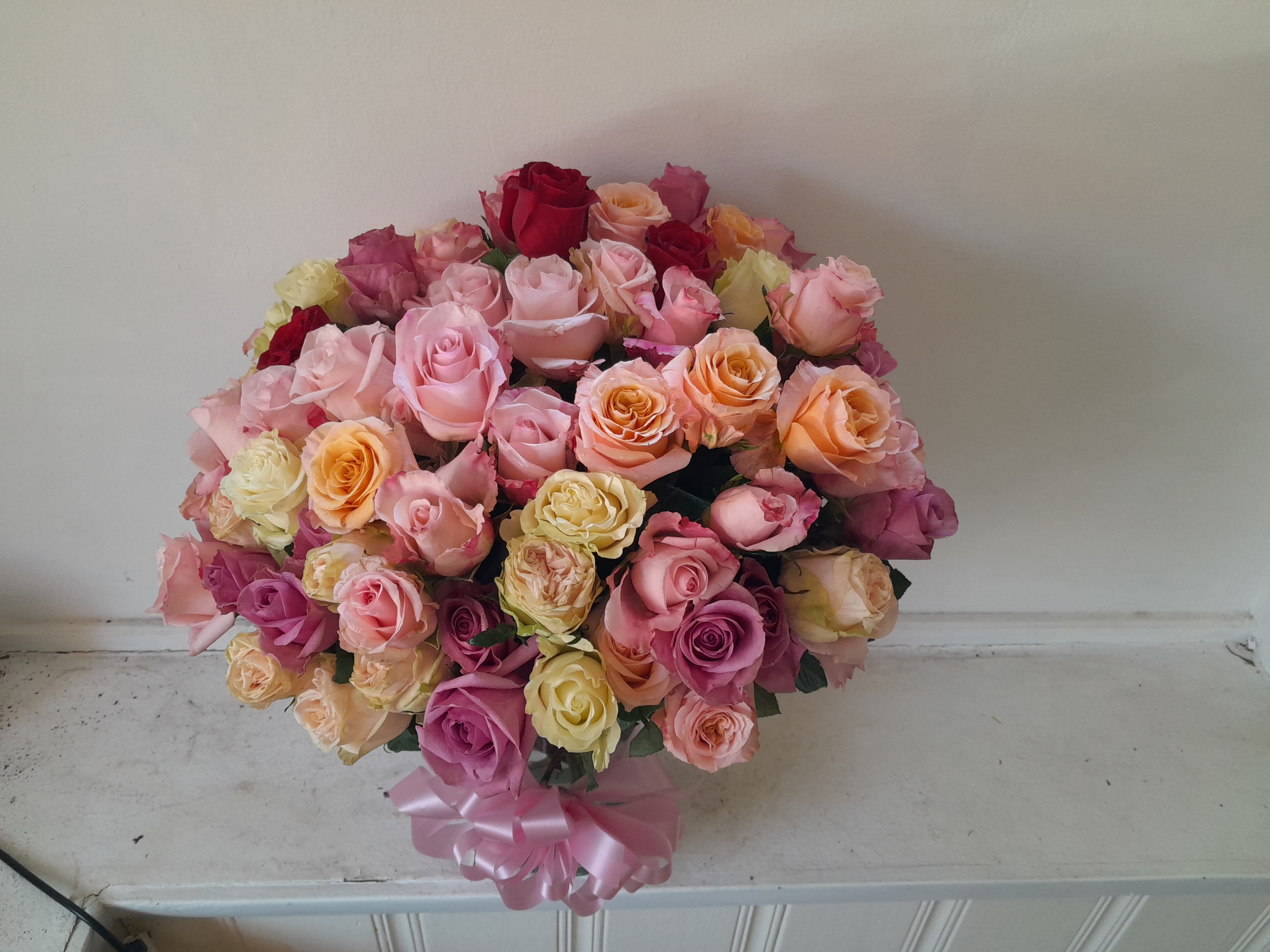 Cream puff - Beautiful all shades of pink 100 roses in a hand tied bouquet