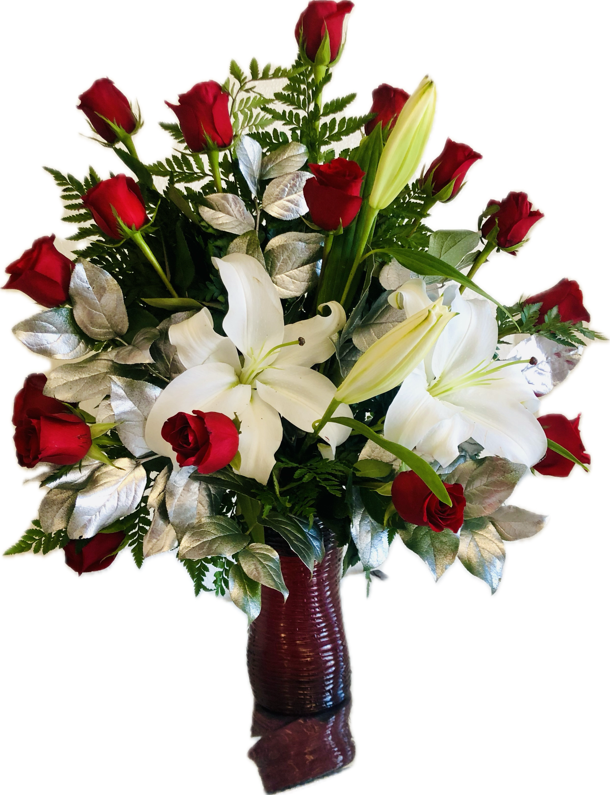 18 Red Roses w/ lily 18 Red Roses w/ lily - 18 red roses combined with white lilies arranged in a red vase