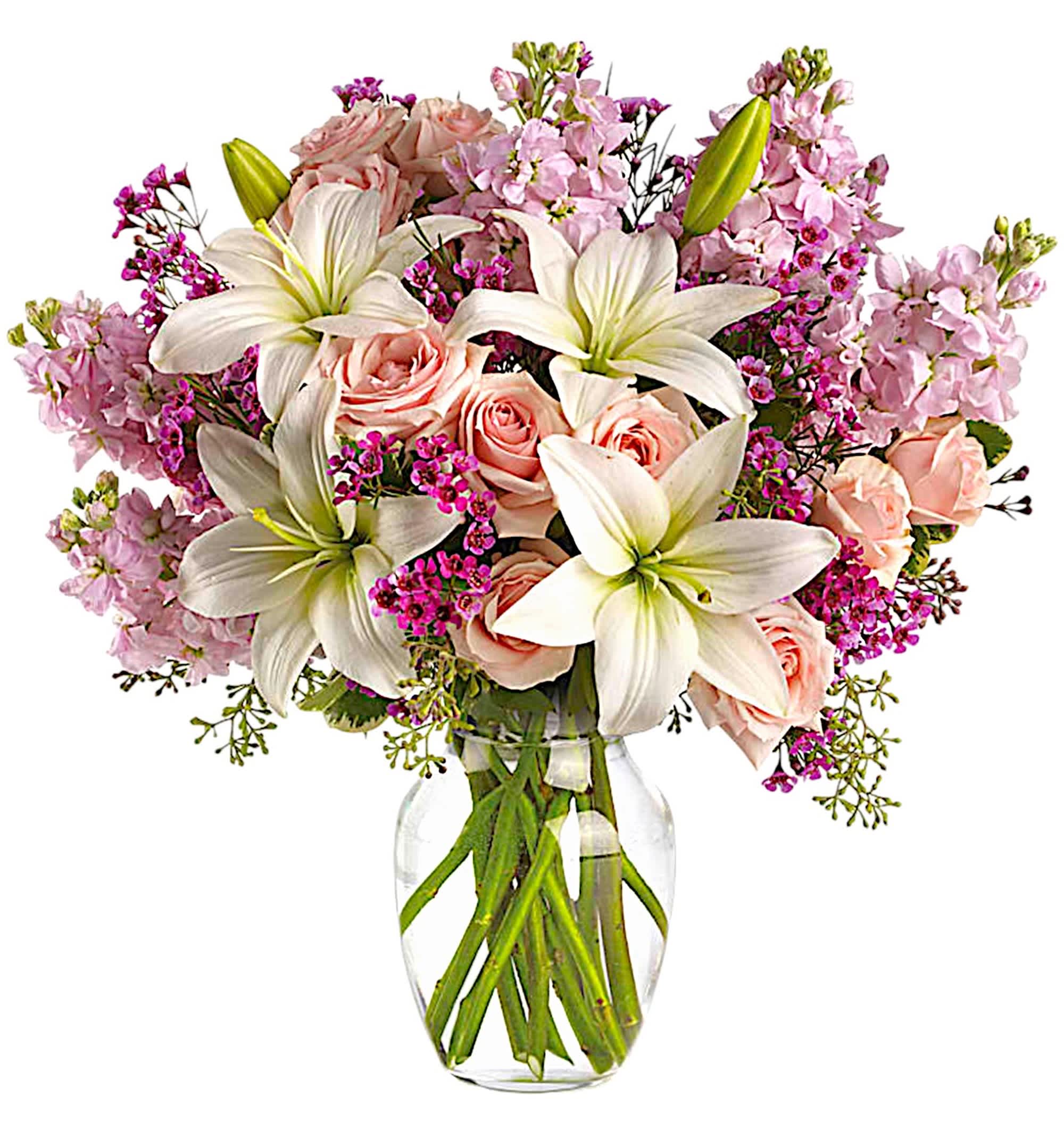 Blossoming Romance - Put your love into the season's most romantic flowers - light pink roses, fragrant white Asiatic lilies and other favorites in a dazzling clear glass vase. Love will blossom in the most intoxicating way.   DETAILS This spectacular arrangement includes light pink spray roses, white Asiatic lilies, lavender stock and lavender waxflower accented with assorted greenery.  VASE INCLUDED Item #NF-969 Orientation: All-Around  FLORIST-TO-DOOR Same day flower delivery on most orders placed online by 12 pm or 10 am on weekends PST.  BLOOM DETAILS Spray Roses Asiatic Lilies Stock Waxflower Greenery  The Standard Arrangement is approx. 17&quot; H x 17&quot; W. The Deluxe Arrangement is approx. 18&quot; H x 17 1/2&quot; W. The Premium Arrangement is approx. 18&quot; H x 18&quot; W.  How to place an order?  1. You can place an order directly on this secure website. OR 2. You can call in your order by dialing: (323) 262 - 9238 OR 3. You can visit our store (appointment recommended 323.262.9238)  NINFA'S FLOWERS 2405 WHITTIER BLVD. LOS ANGELES, CA. 90023  ATTENTION: *Please note that on busy holidays, Valentine's Day, and Mother's Day, we cannot verify if the recipient received the flowers until the following day. You can verify delivery on the website after 10:00 pm, call 323.262.9238 the following day after 10:00 am, or contact the recipient directly. Thank you for your patience and understanding.