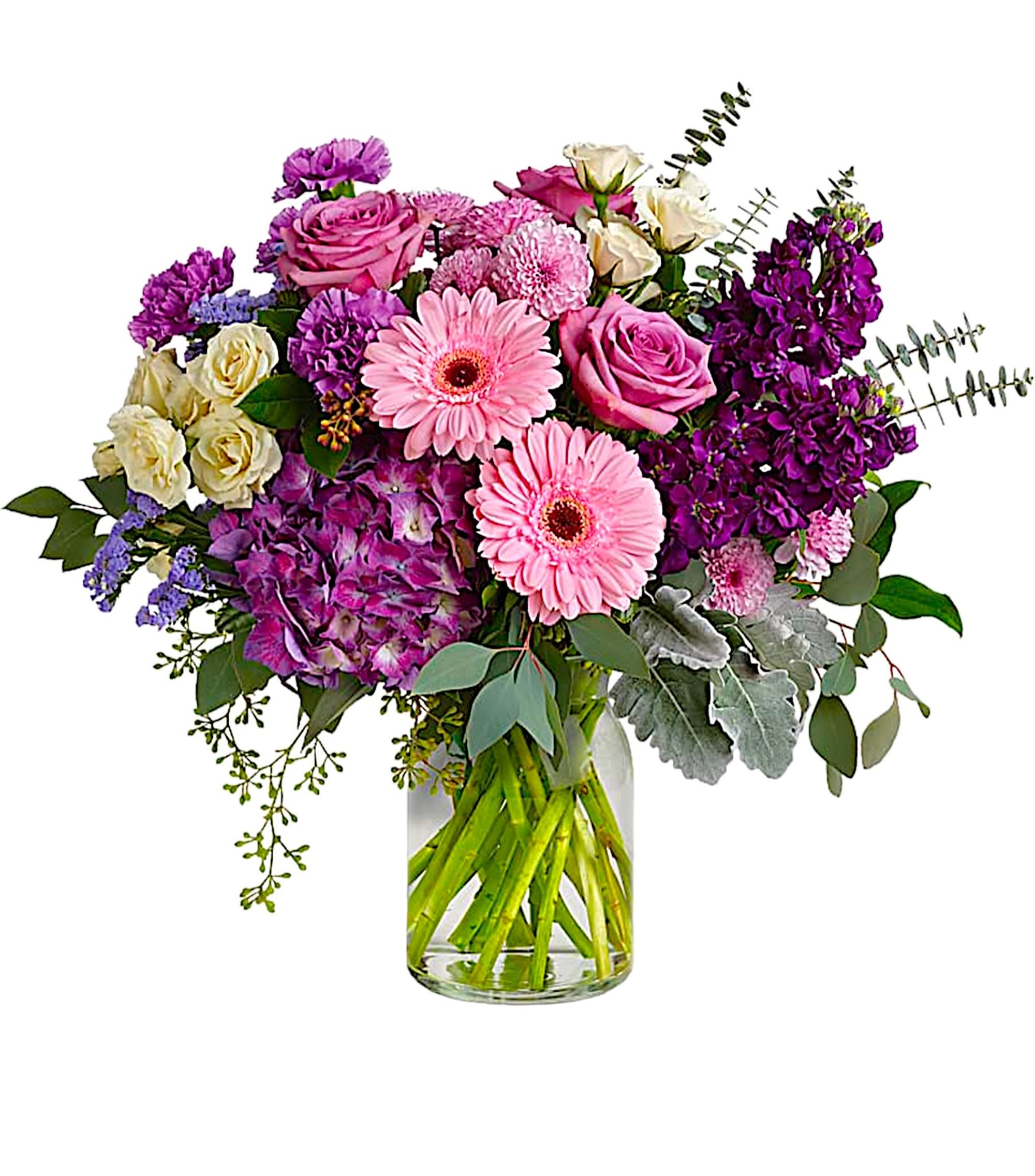 Magnificent Mauves - Bring beauty to any occasion with the deep purples and playful pinks of this breathtaking arrangement.  DETAILS This magnificent arrangement features purple hydrangea, lavender roses, crème spray roses, pink gerberas, lavender carnations, purple stock, lavender cushion spray chrysanthemums, statice, dusty miller, spiral eucalyptus, seeded eucalyptus, silver dollar eucalyptus, and lemon leaf.  VASE INCLUDED Orientation: All-Around Item #NF-374  FLORIST-TO-DOOR Same day flower delivery on most orders placed online by 12 pm or 10 am on weekends PST.  BLOOM DETAILS Roses Gerbera Daisies Carnations Spray Roses Cushion Mums Stock Hydrangea Statice Filler Greenery  The Standard Arrangement is approx. 20 1/2&quot; H x 23&quot; W. The Deluxe Arrangement is approx. 20 1/2&quot; H x 23&quot; W. The Premium Arrangement is approx. 21&quot; H x 23&quot; W.  How to place an order? 1. You can place an order directly on this secure website OR 2. You can call in your order by dialing: (323) 262 - 9238 OR 3. You can visit our store (appointment recommended 323.262.9238)  NINFA'S FLOWERS 2405 WHITTIER BLVD. LOS ANGELES, CA. 90023  ATTENTION: *Please note that on busy holidays, Valentine's Day, and Mother's Day, we cannot verify if the recipient received the flowers until the following day. You can verify delivery on the website after 10:00 pm, call 323.262.9238 the following day after 10:00 am, or contact the recipient directly. Thank you for your patience and understanding.