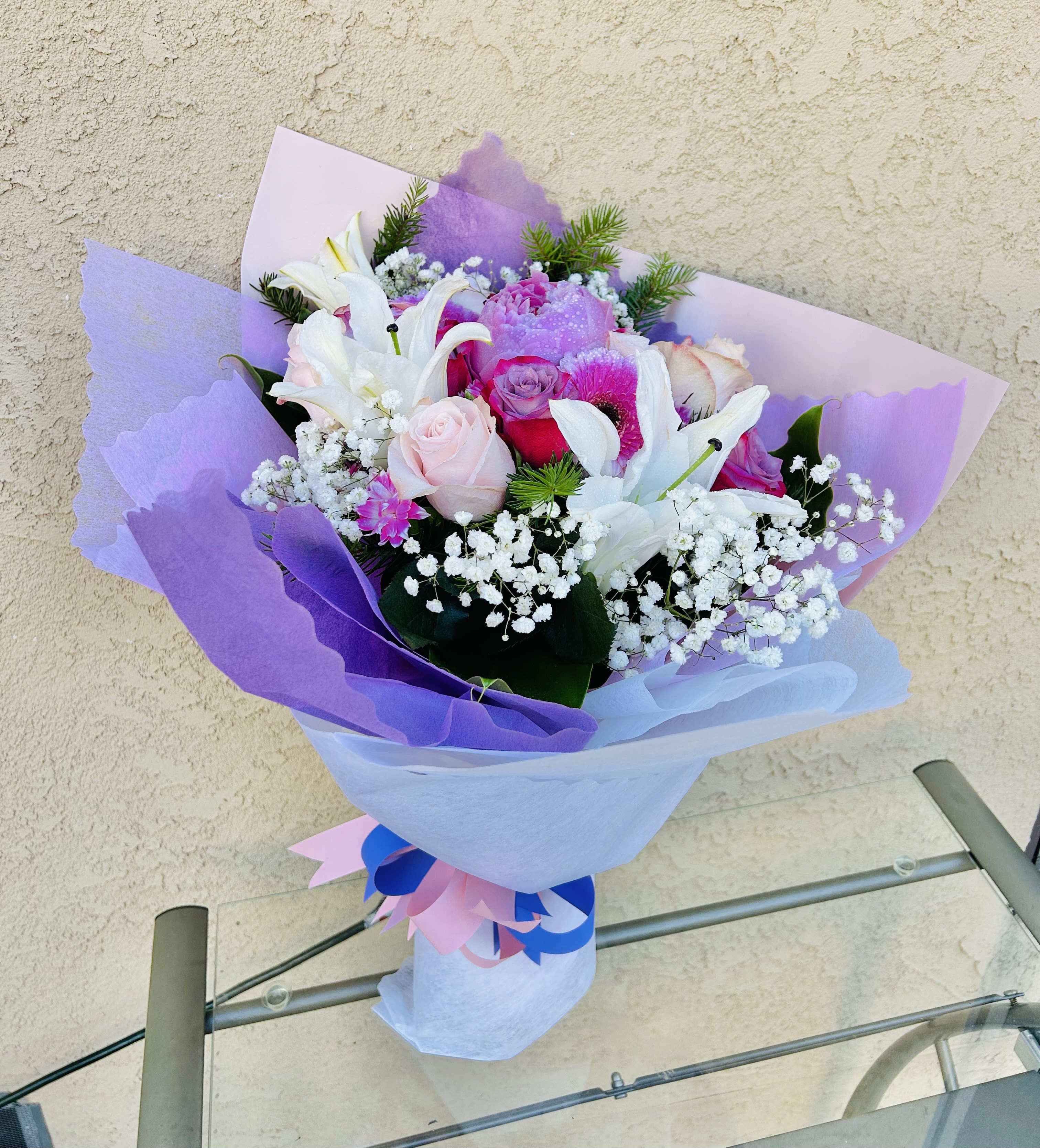 The Muse - Beautiful bouquet featuring lilies, pink and red roses, baby breathe, daises, and peony(seasonal).