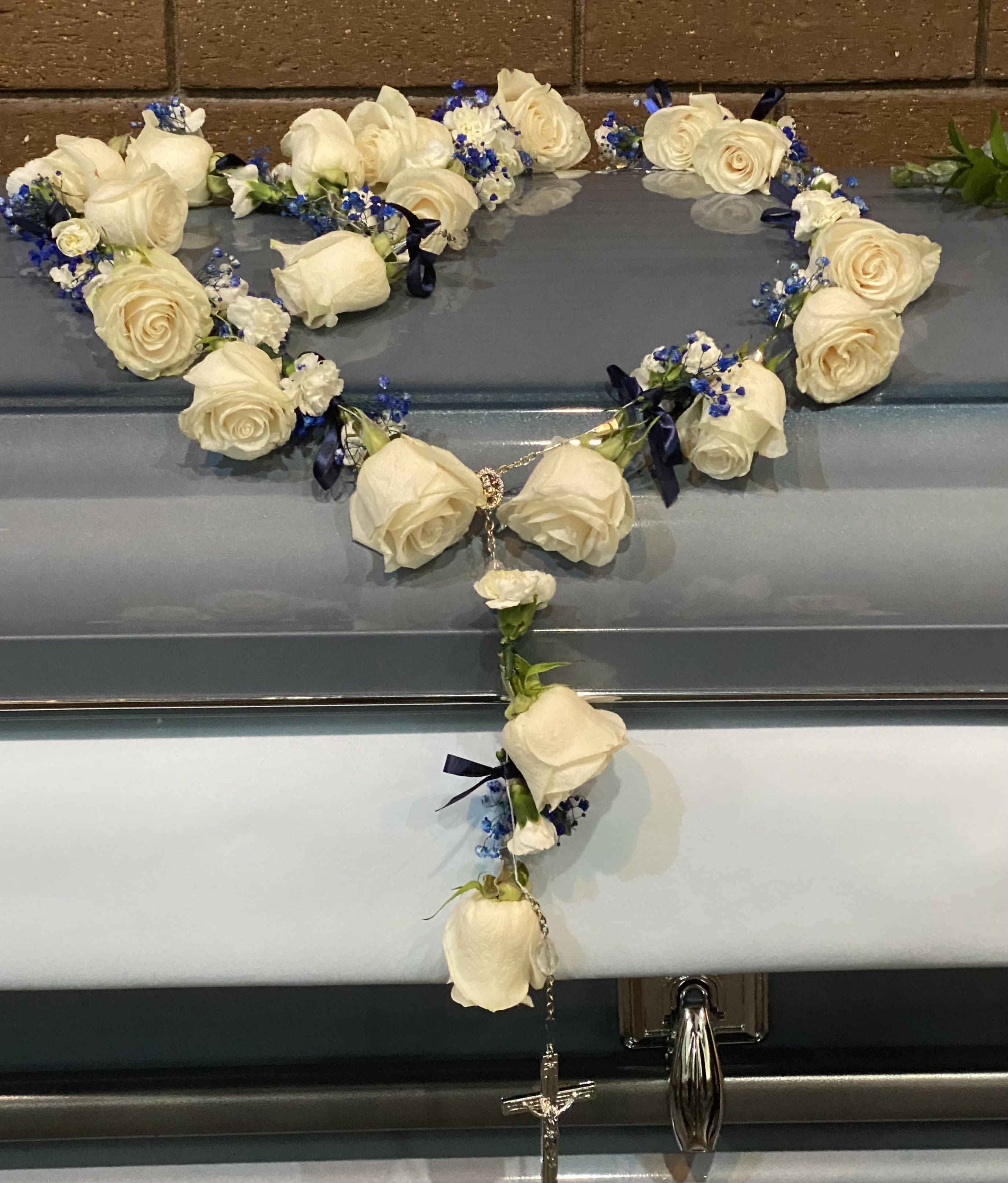 Heavens Above Rosary - White roses and touches blue baby’s breat with white mini carnations 