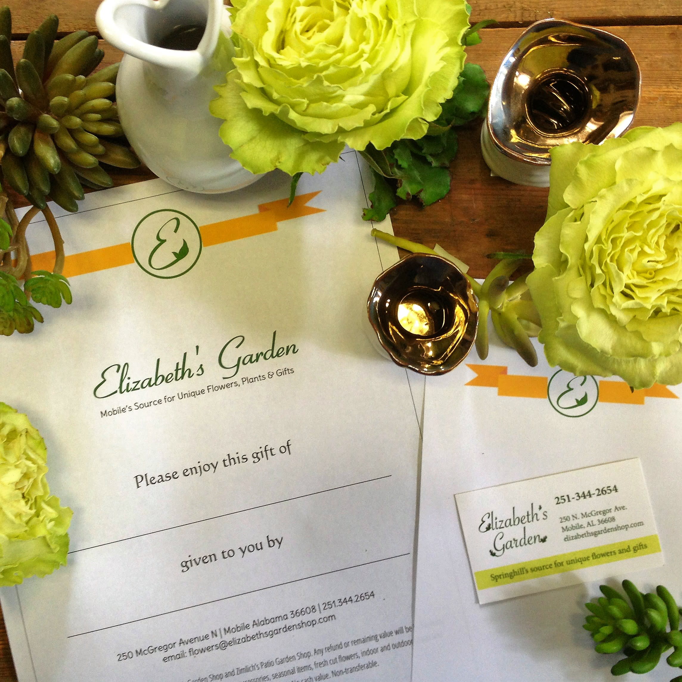 Gift Certificate - Give the gift of choice with an Elizabeth's Garden Gift Certificate, a thoughtful present for any occasion. Redeemable for our unique collection of premium floral arrangements, living plants, seasonal items, and home accessories, it’s a gift that truly delights. -Versatile Options: Good for fresh-cut flowers, indoor tropical plants, outdoor patio plants, ready-made gardens, and more. -Perfect for Any Occasion: Birthdays, holidays, anniversaries, or just because—this gift certificate is always appreciated. -Support Local: Celebrate the beauty of Mobile with a gift that highlights our curated selection of high-quality merchandise. Whether for a gardening enthusiast, a home décor lover, or someone who simply enjoys beautiful things, an Elizabeth's Garden Gift Certificate is the ultimate way to share joy and elegance.