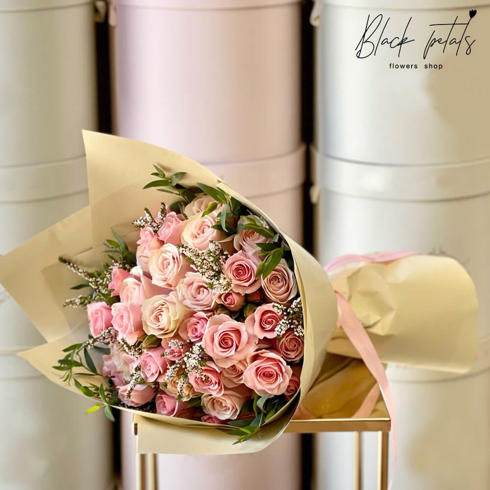 Petite Enchanted Blush Hand-Tied Bouquet Petite Enchanted Blush Hand-Tied Bouquet - A mesmerizing blend of delicate blush pink shades that embody beauty, grace, and a touch of magic. Carefully handcrafted by our skilled florists, this Petite Enchanted Blush Hand-Tied Bouquet captures the essence of romance and elegance in every bloom. Disclaimer: Please note that this bouquet is a hand-tied arrangement and should be placed in a vase with water immediately upon receiving it. This will ensure that the flowers remain fresh and vibrant for an extended period. Arrangement includes: Fresh BP Signature roses and spray roses BP iconic floral wrapping paper & ribbon Care instructions Custom greeting card DISCLAIMER: FRESH FLOWERS: These are fresh-cut flowers and are perishable. Please follow care instructions in Care & Handling