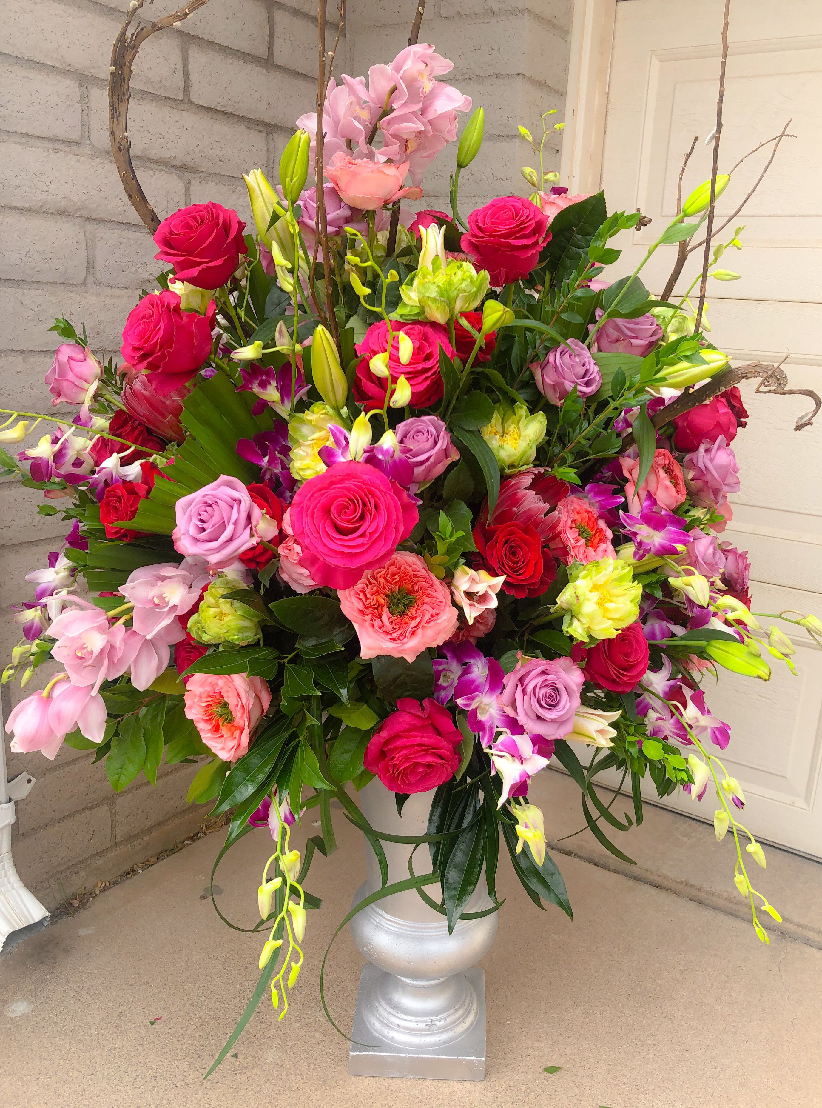 THE BIGGEST HEART - A HUGE FLORAL PIECE WITH A BEAUTIFUL ASSORTMENT O SEASONAL BLOOMS I A CUSTOM CONTAINER
