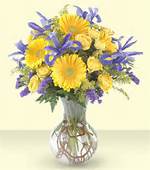 Happy Blooms Happy Blooms - A bright beautiful mix of ARTIFICIAL purple iris, yellow roses and gerberas with pretty filler flowers to brighten up anyone's day and send them some cheerful sentiments and happiness!!