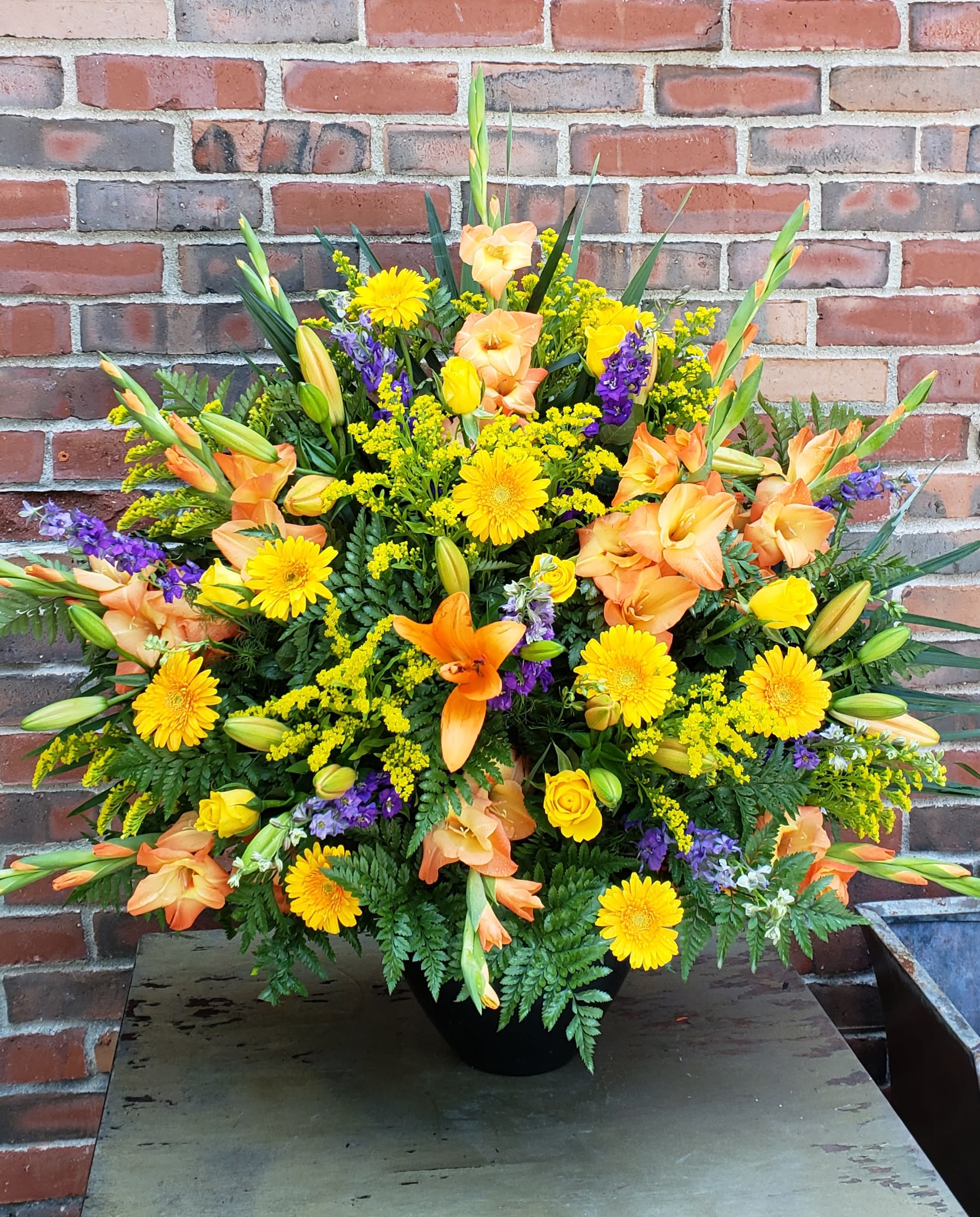 cpD-Yellow Tribute cpD-Yellow Tribute - Mixed basket arrangement of yellow mix florals.