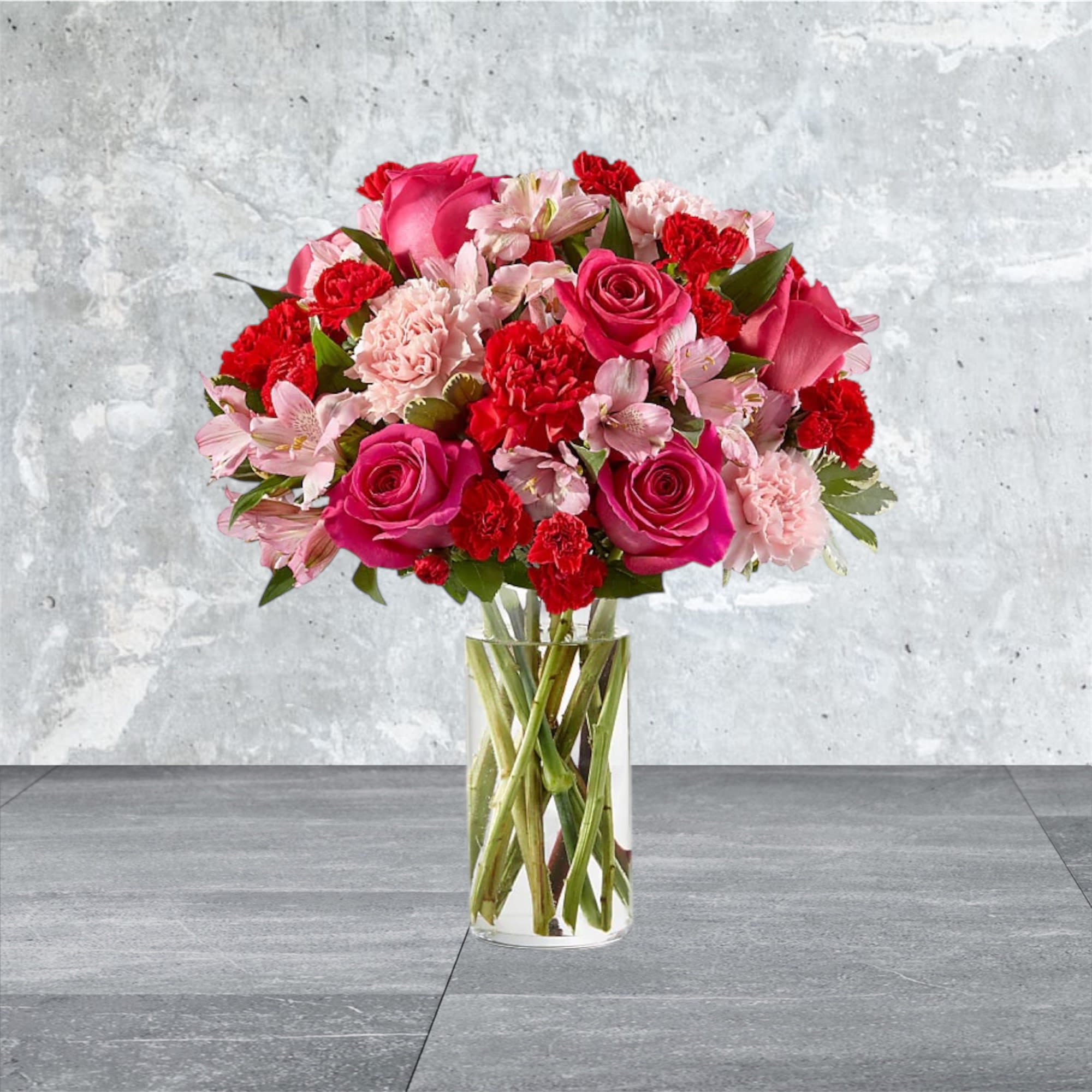 Pretty Sweet - A stunning symphony of soft pink hues, this bouquet features delicate carnations, graceful alstroemeria, and classic roses. Perfectly arranged to embody elegance and charm, it’s the ultimate gesture of love, gratitude, or just because. Let this dreamy arrangement speak volumes without saying a word!