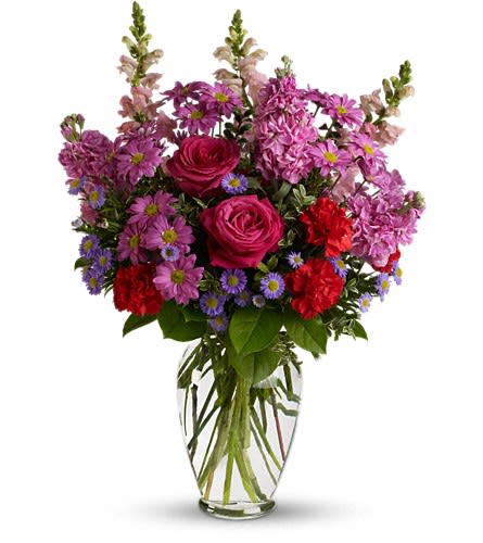 Dreaming of You Dreaming of You - Brighten their day with this glorious array of hot pink roses pink snapdragons and other favorites in a sparkling clear glass vase. The perfect gift for a birthday anniversary or any special day. The colorful bouquet includes hot pink roses red carnations pink snapdragons pink stock lavender monte casino asters and lavender daisy spray chrysanthemums accented with fresh greenery. Delivered in a clear glass vase.Approximately 18" W x 25" H Orientation: All-Around As Shown : T520-1A