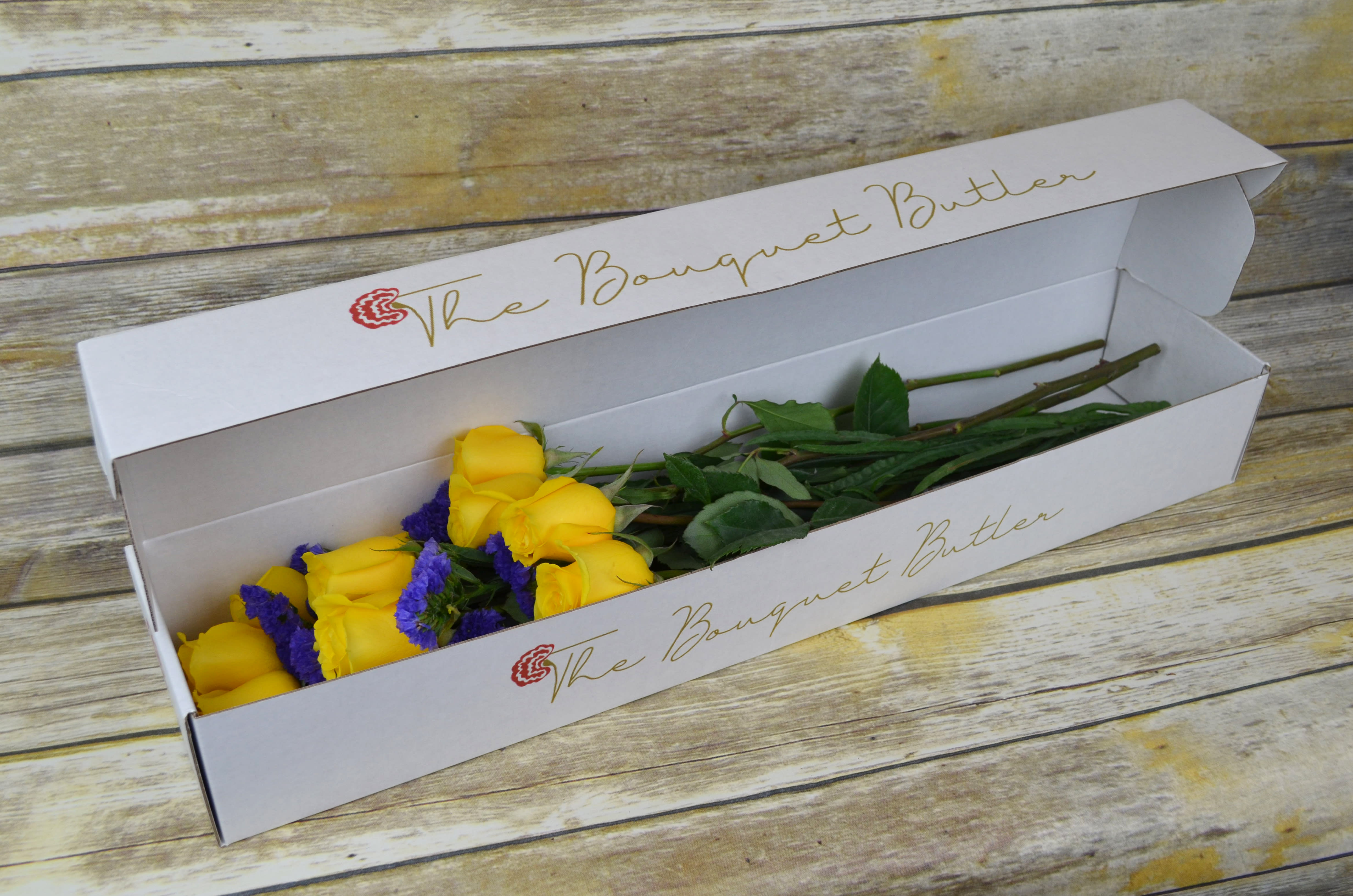 Caring Warmth - Boxed - Yellow roses convey joy and comradery. All bouquets are arranged by our professional floral design team accented with seasonal filler (i.e. greenery, baby’s breath, etc.). Our team selects the freshest flowers available, so shade of rose may vary due to seasonal availability. Blooms are hand delivered in person to enhance any celebration or a “just because” surprise. Deliveries are done between 10am - 5pm. If the recipient is not home we will leave the delivery if safe from the elements. We will call or text the recipient and let them know a delivery has been left. 