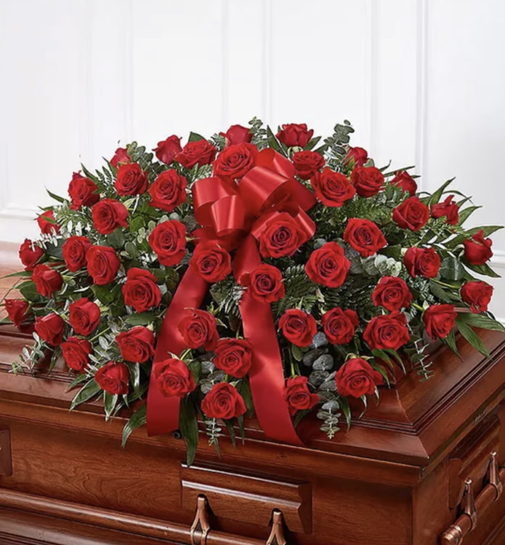 Red Remember Red Remember - Celebrate a Life of Love and Passion ️ Introducing our Premium Red Rose Casket Spray – a striking tribute designed with the elegance of radiant red roses, lush greenery, and a luxurious red satin bow. This timeless arrangement conveys deep respect, enduring love, and heartfelt remembrance. Features: • Vibrant, fresh red roses • Complemented with lush foliage • Thoughtfully handcrafted for a meaningful farewell Perfect for honoring a life lived with love and devotion. Let us assist you in creating a meaningful tribute that speaks from the heart. Contact us to customize your arrangement today.