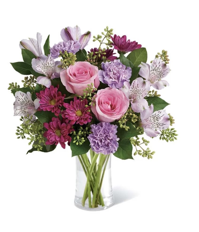 Violet Romance - A romantic and enchanting arrangement featuring a mix of soft pink roses and vibrant purple blooms. This bouquet combines the elegance of pink roses with the cheerful charm of purple alstroemeria and carnations. A perfect gift to express love, appreciation, and a touch of personality.