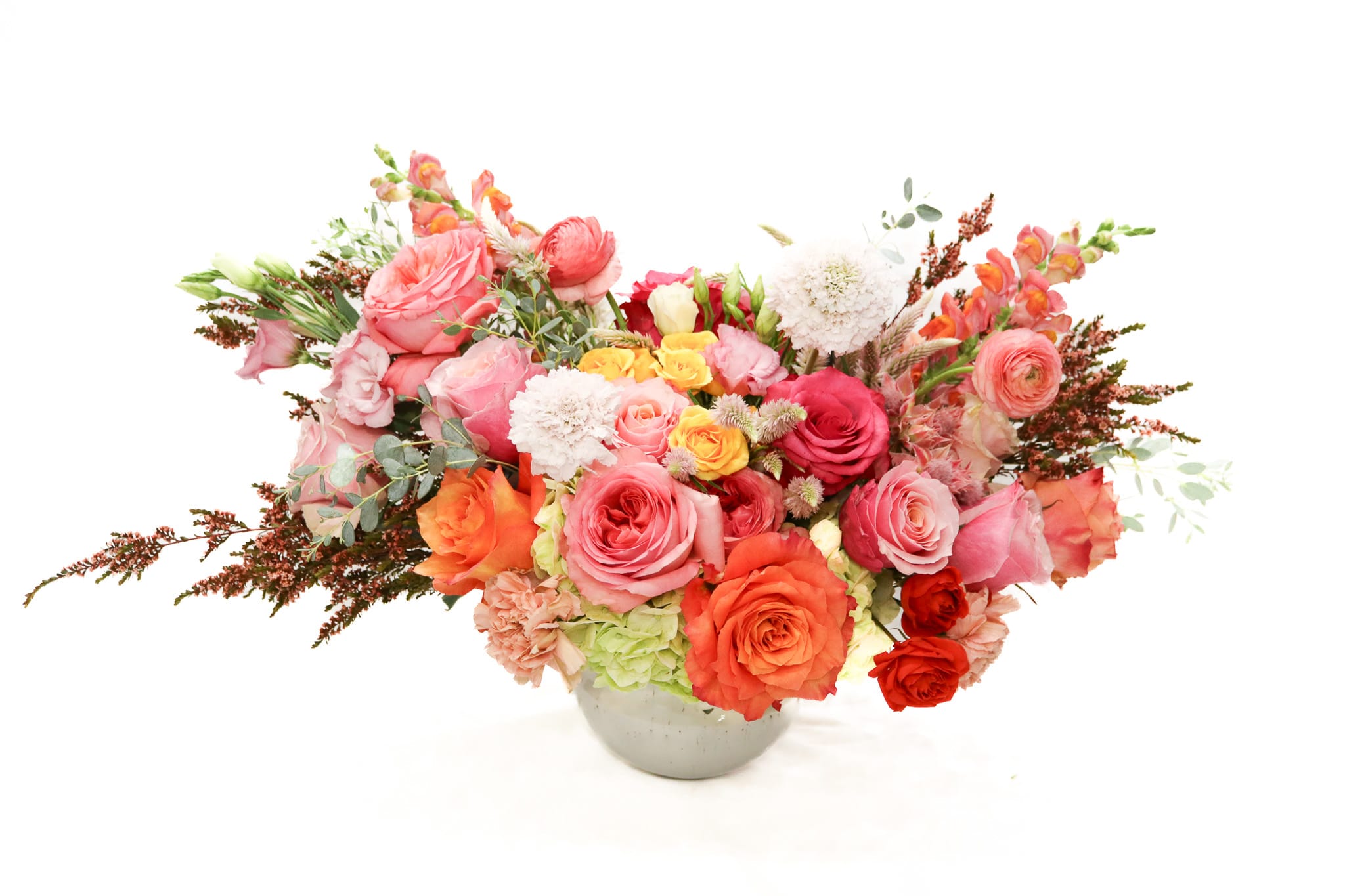Rainbow - Fall Rainbow is our newest arrangement from our Luxury Collection, happy and colorful, perfect for any occasion. Comes in a ceramic vase. 