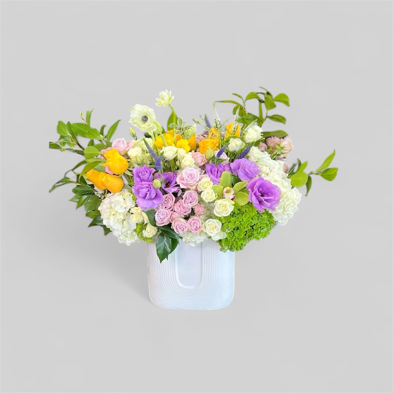 China  Violet Blue - This truly modern design features luxurious Ultra-violate and purple Vanda incorporated with different color of vanda orchid to provide the volume.  It would be perfect for any occasions.