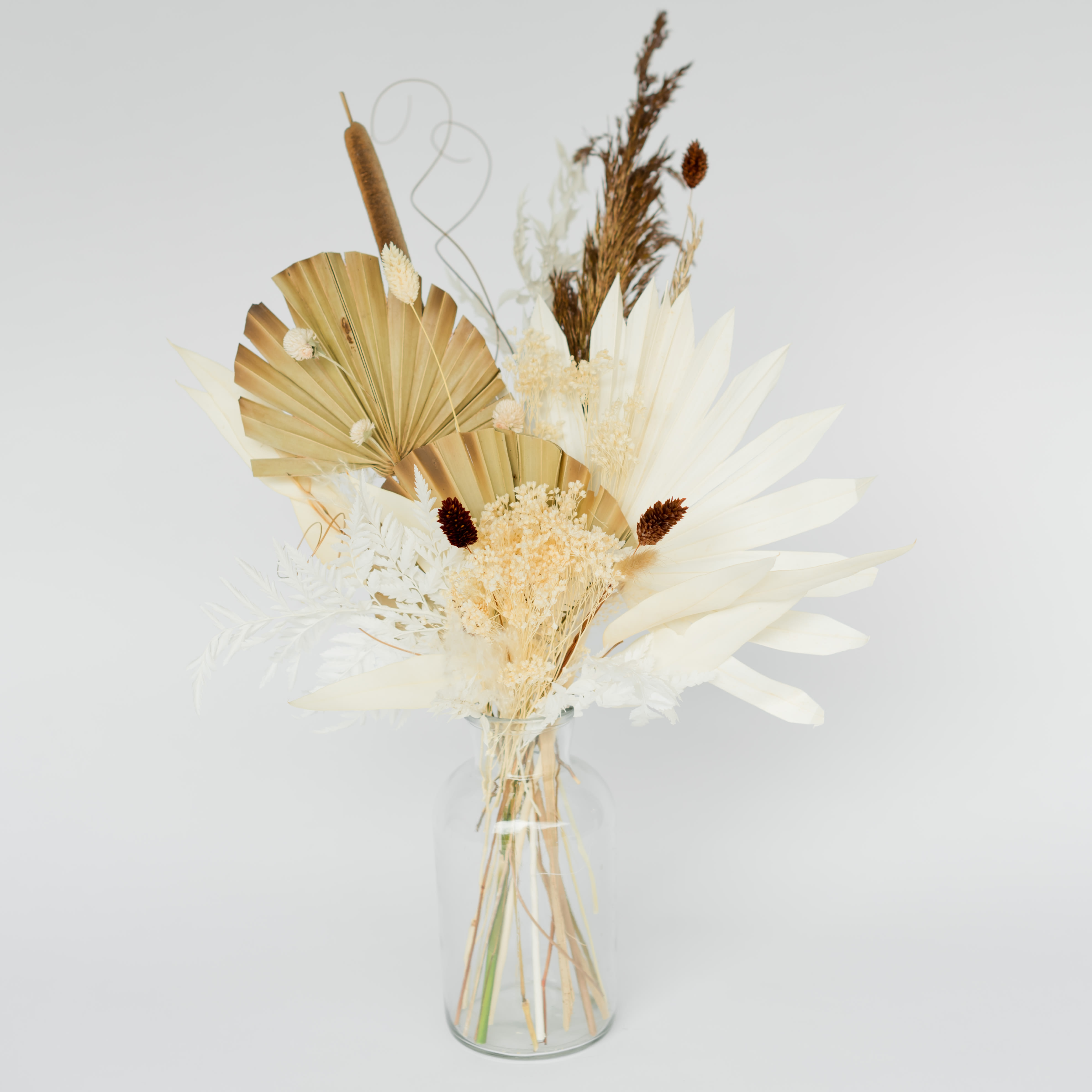 17 | le marais - Dried floral arrangement that brings a trendy and unique look. (The vase pictured is currently on back order. We will use a clear bud vase with a more round bottom. Thank you for understanding!)