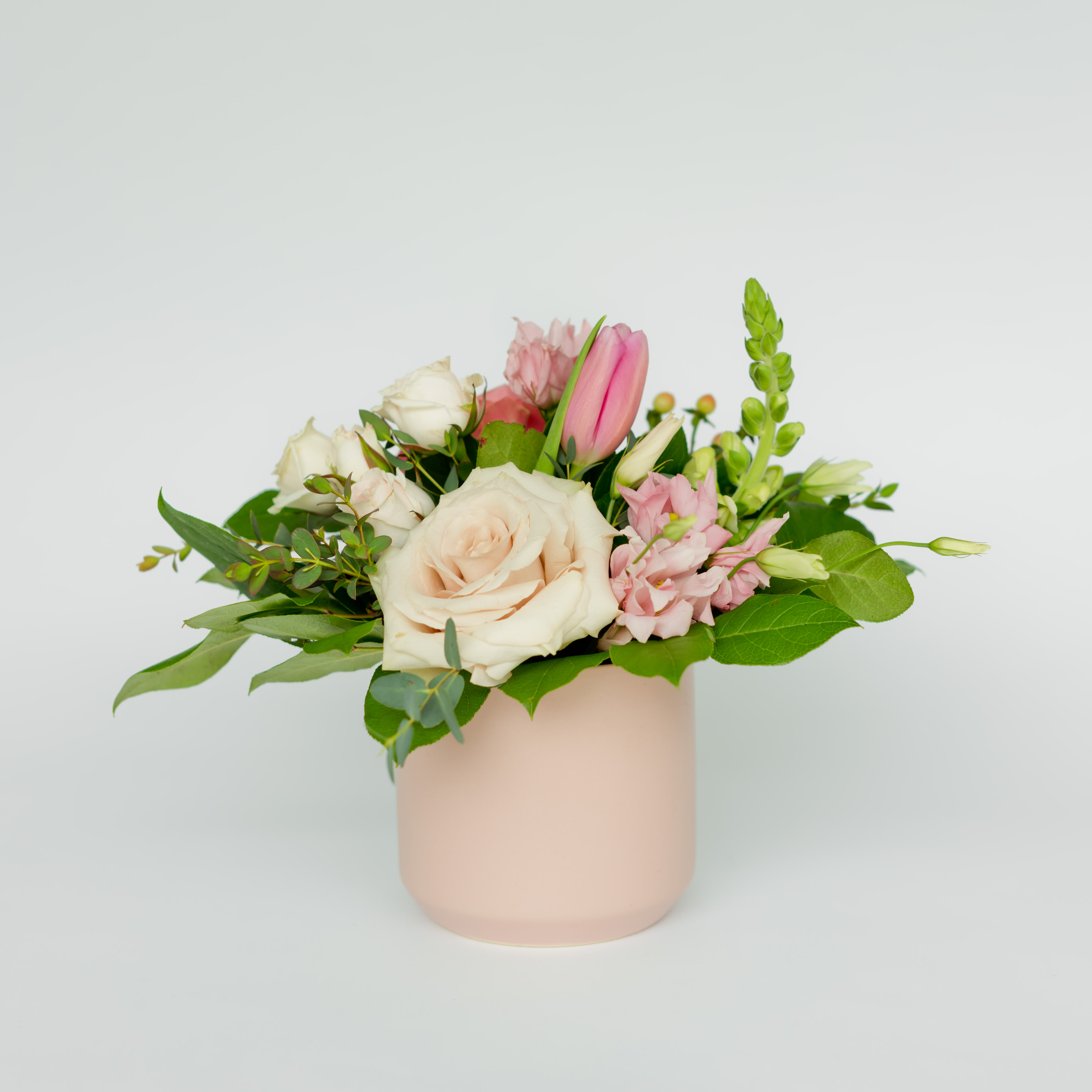 35 | toulouse 35 | toulouse - Sometimes the best things come in small packages. Sweet design incorporating seasonal blooms and foliage. Due to chain shortages this arrangement will possibly come in a pink, white or black ceramic pot.