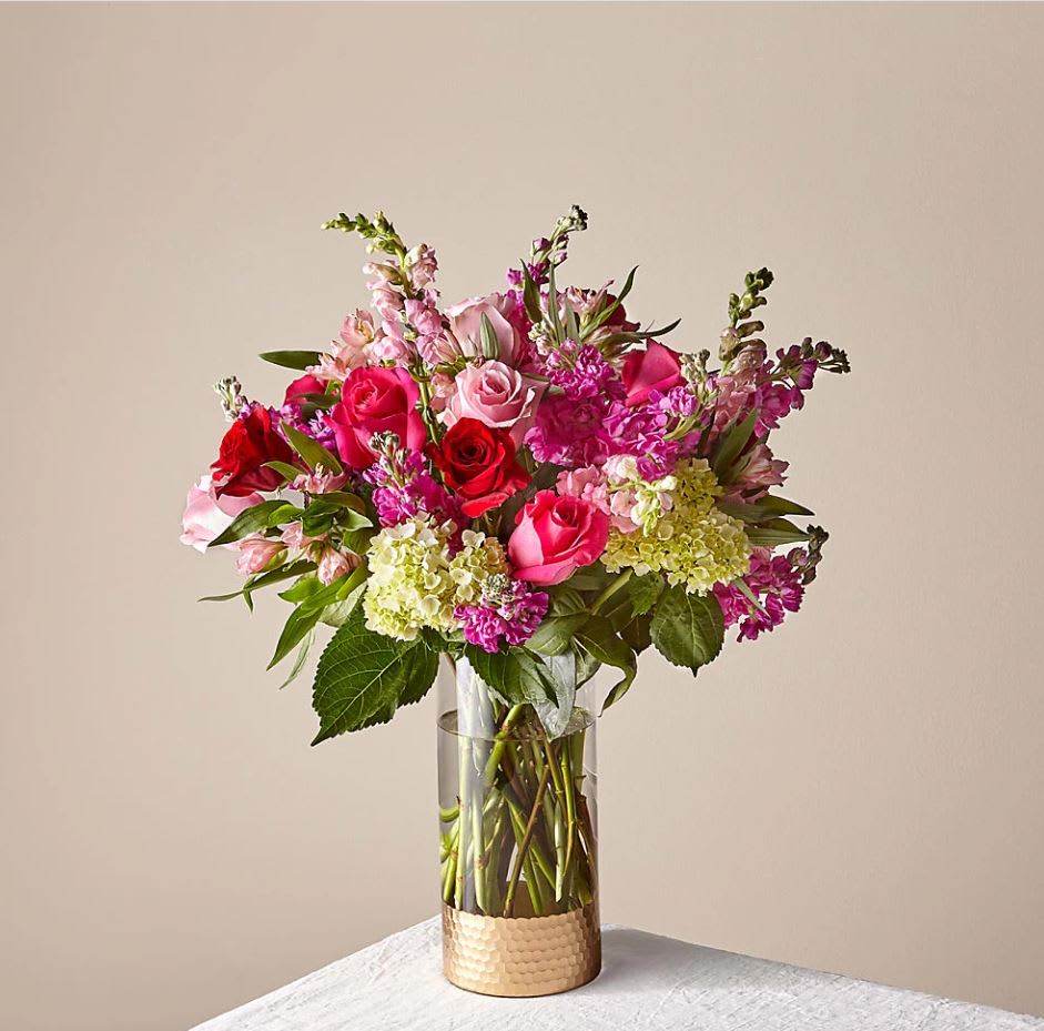 You &amp; Me Luxury Bouquet - The bouquet is about 27&quot;H by 22&quot;W. For long–lasting blooms replace water and trim stems daily. The bouquet pictured reflects our original design for this product. While we always try to follow the color palette, we may replace stems to deliver the freshest bouquet possible, and we may sometimes need to use a different vase.