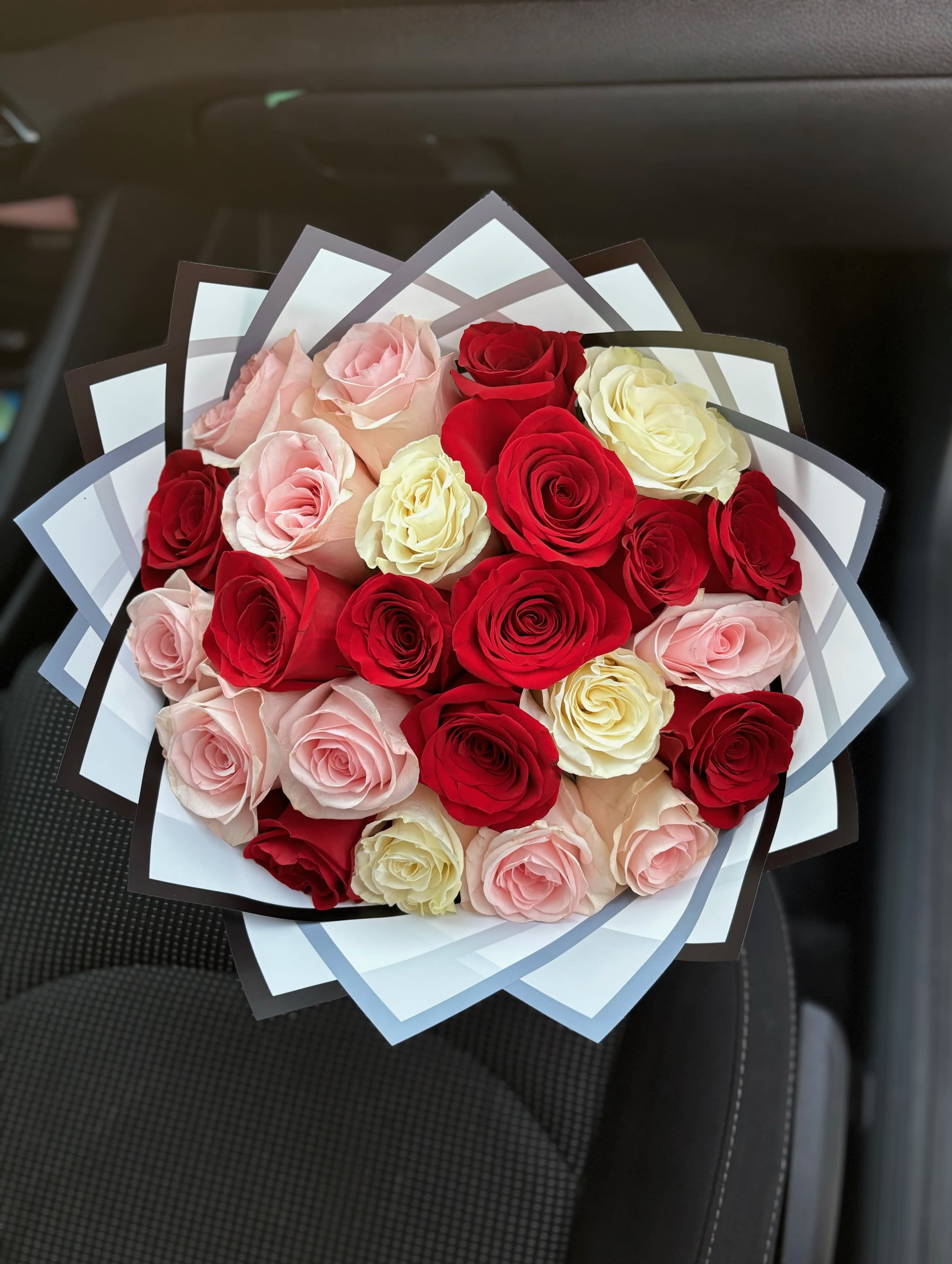 Truly Adored Bouquet - Classy bouquet with beautiful pink, white and red roses.