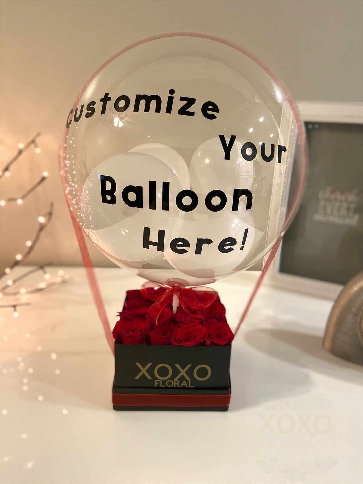 My Boxie Box Customized Balloon - Our luxury handcrafted flower box arrangement make the perfect gift for any occasion.  With My Boxie Box by XOXO we can customize your Balloon and your Box!!!  ^^CUSTOMIZE YOUR ORDER^^ Once you click on &quot;ORDER NOW'  your next step is to tell us what you will like to say on the BALLOON and CARD MESSAGE on &quot;Special Instructions&quot;  Example:  BALLOON: I LOVE YOU Card Message: Happy Birthday to the greatest person in the whole world!!  Love, Your Husband.  This boxed roses are available in: red, white, and hot pink! ask for our other flowers available!!