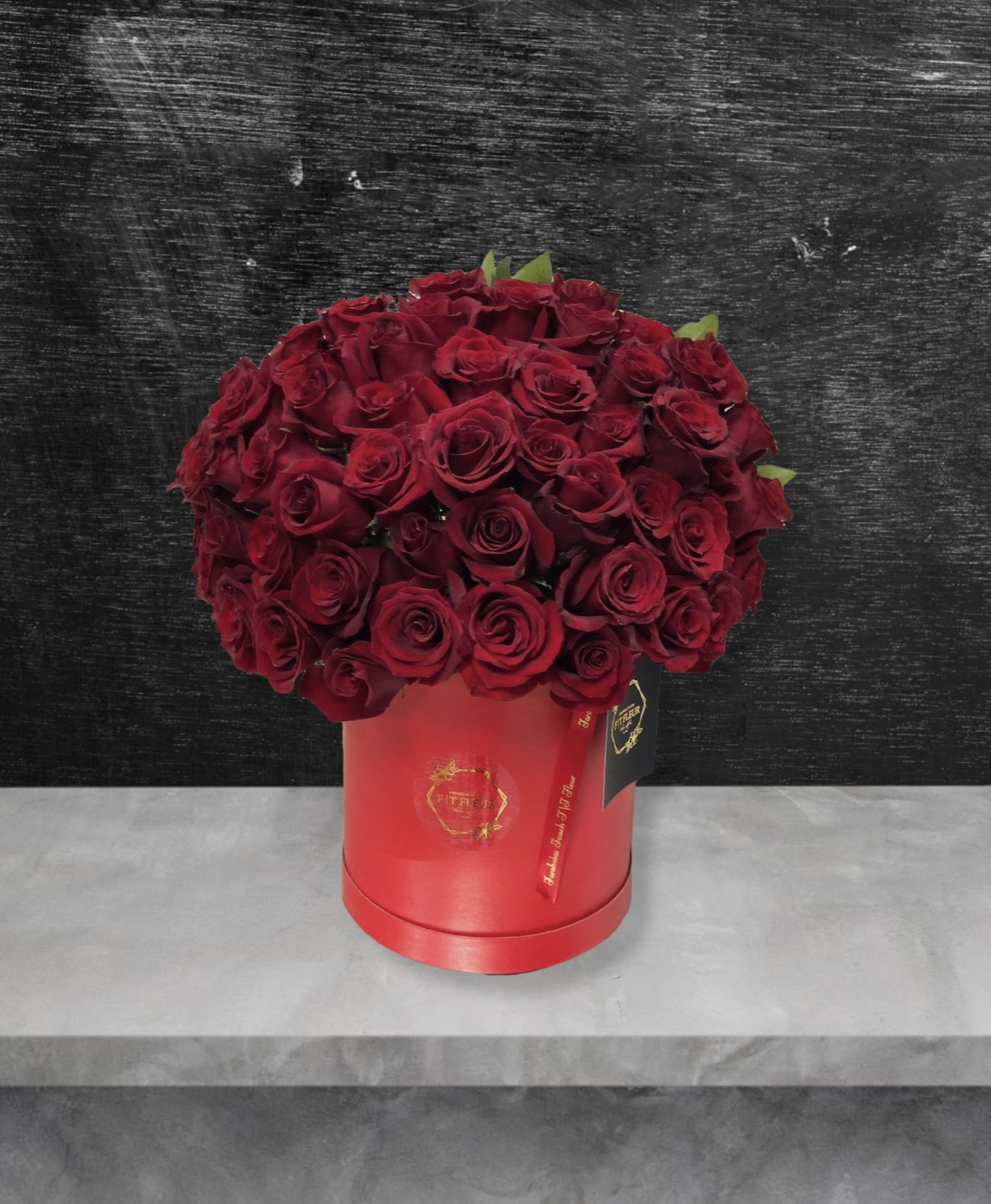 Red Heart Kisses - Introducing **Red Heart Kisses**, a charming medium-sized arrangement that captures the essence of love and affection. Nestled in a stylish hot box, this delightful bouquet features hand-picked roses, each selected with care by our creative design team. The thoughtful arrangement is crafted to embrace the beauty and warmth of your sentiments, making it a perfect gift for your loved one. With its vibrant red blooms and inviting presentation, **Red Heart Kisses** is designed to convey joy and romance, making every moment special. This exquisite arrangement is not only a feast for the eyes but also a heartfelt expression of love, sure to leave a lasting impression on anyone who receives it. The arrangement comes in a hat box filled with fresh red roses, one sided. 