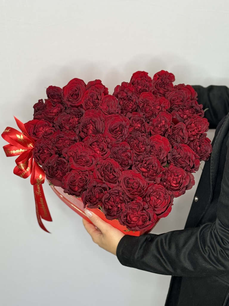 Tempestuous Red  - My oh, my! What red roses do to one's eyes. Show the special someone in your life how much you care with timelessly beautiful red roses. Known globally as a classic demonstration of love and dedication, gifting these fresh flowers will not only speak for themselves but for you, too!