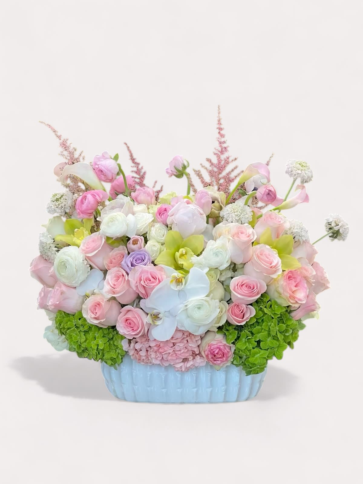 Pink Patty - A modern and sweet arrangement of beautiful pink blooms.